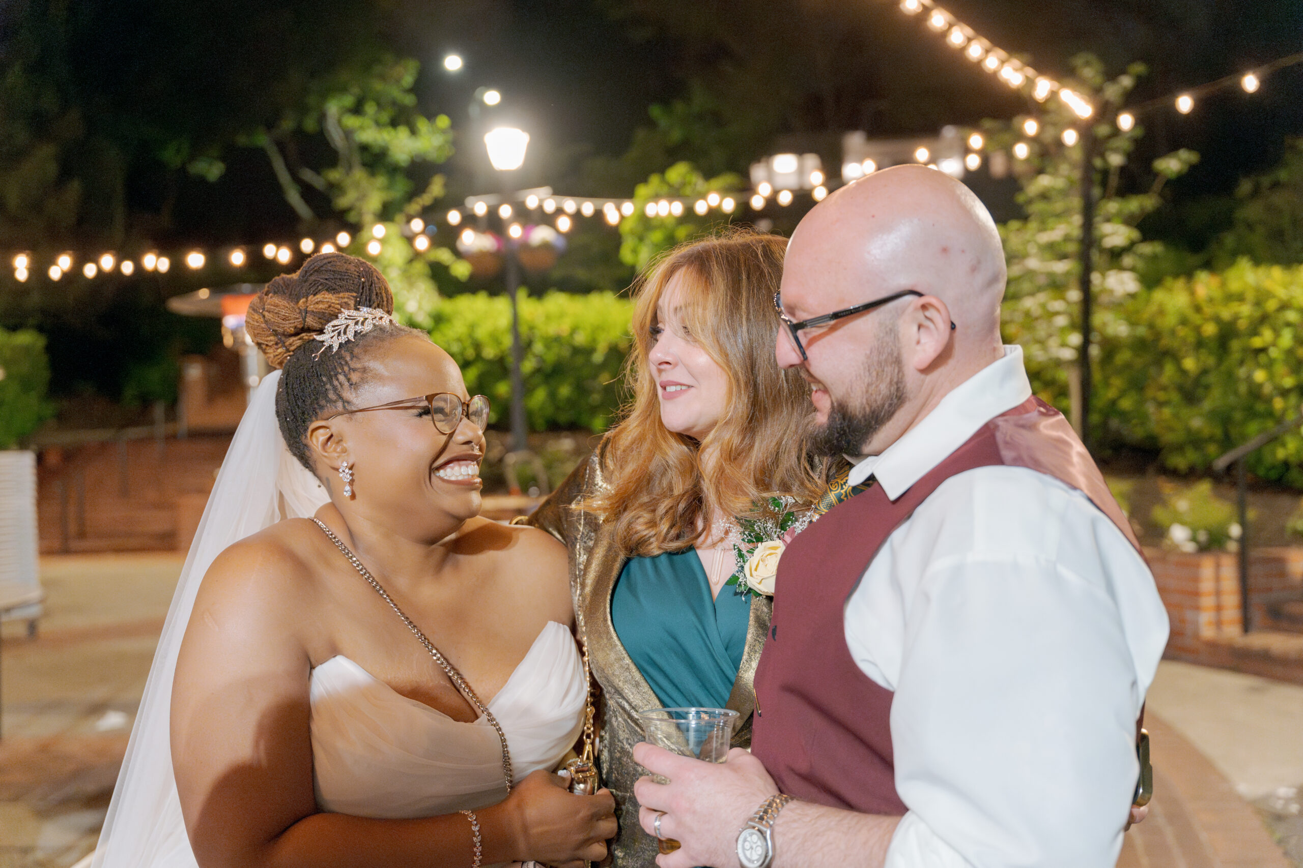 Bride, Groom, and Friend and officiant