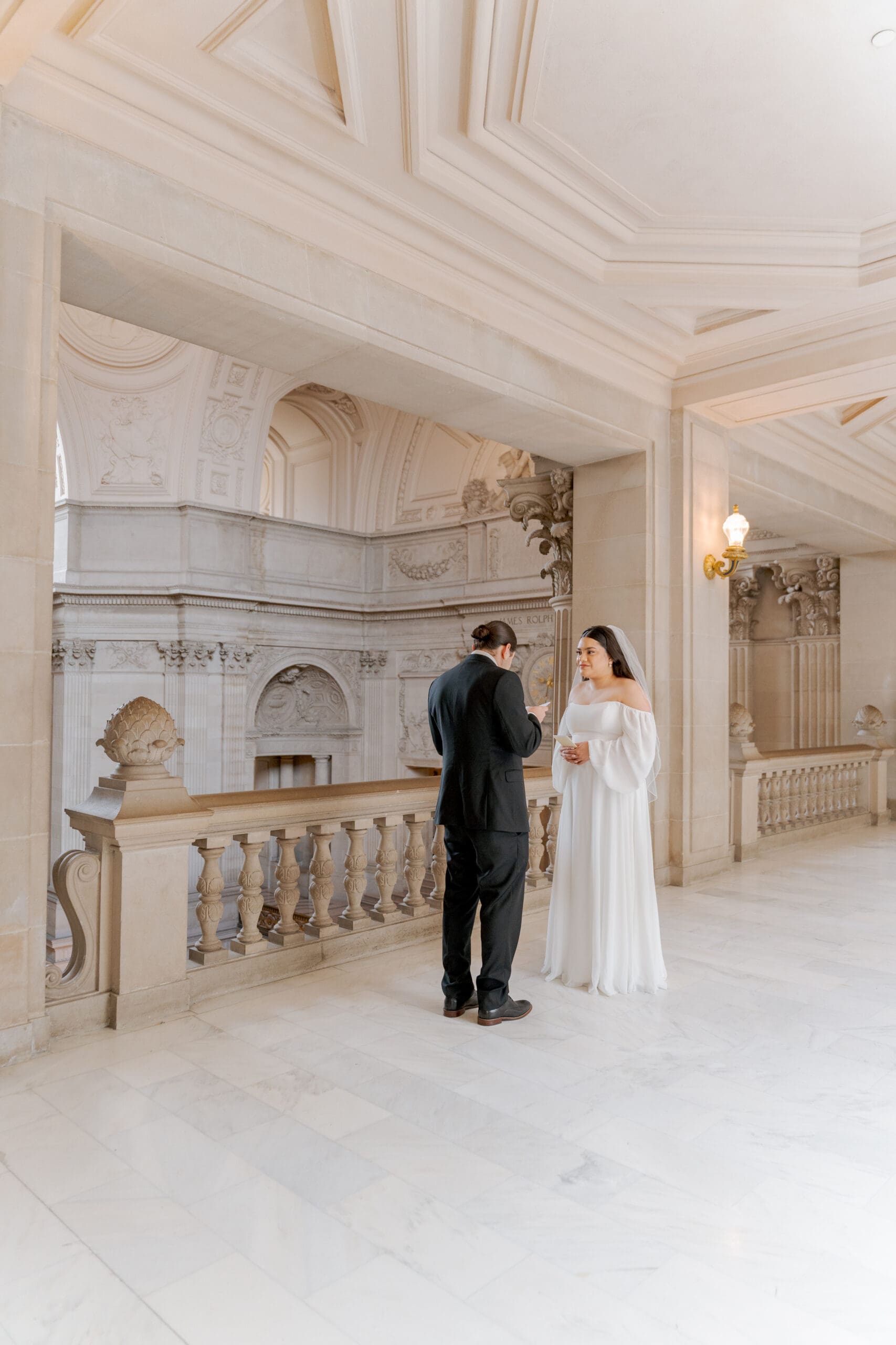 Couple reading their vows during San Francisco City Hall Elopement