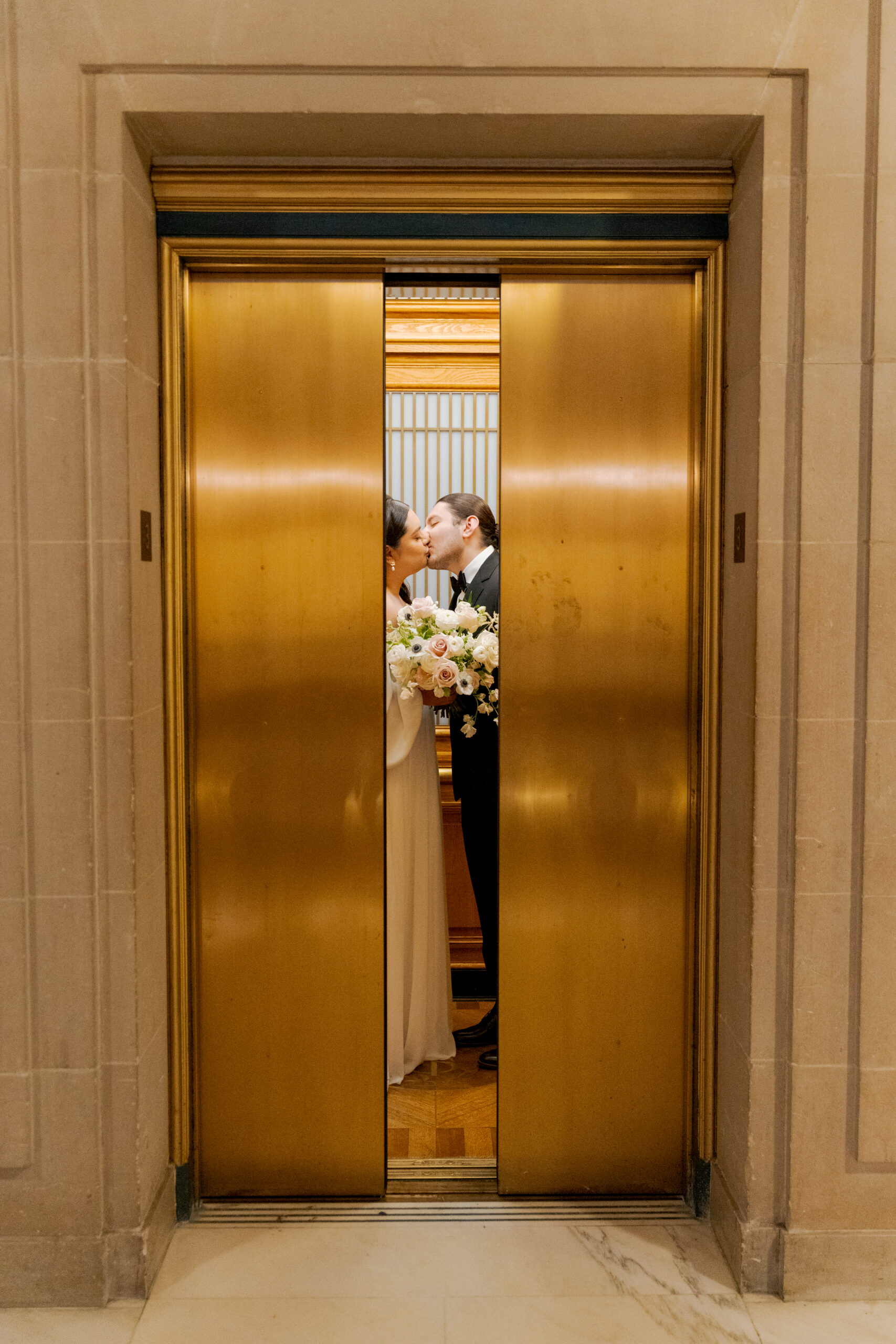 The iconic golden elevator shot in San Francisco City Hall