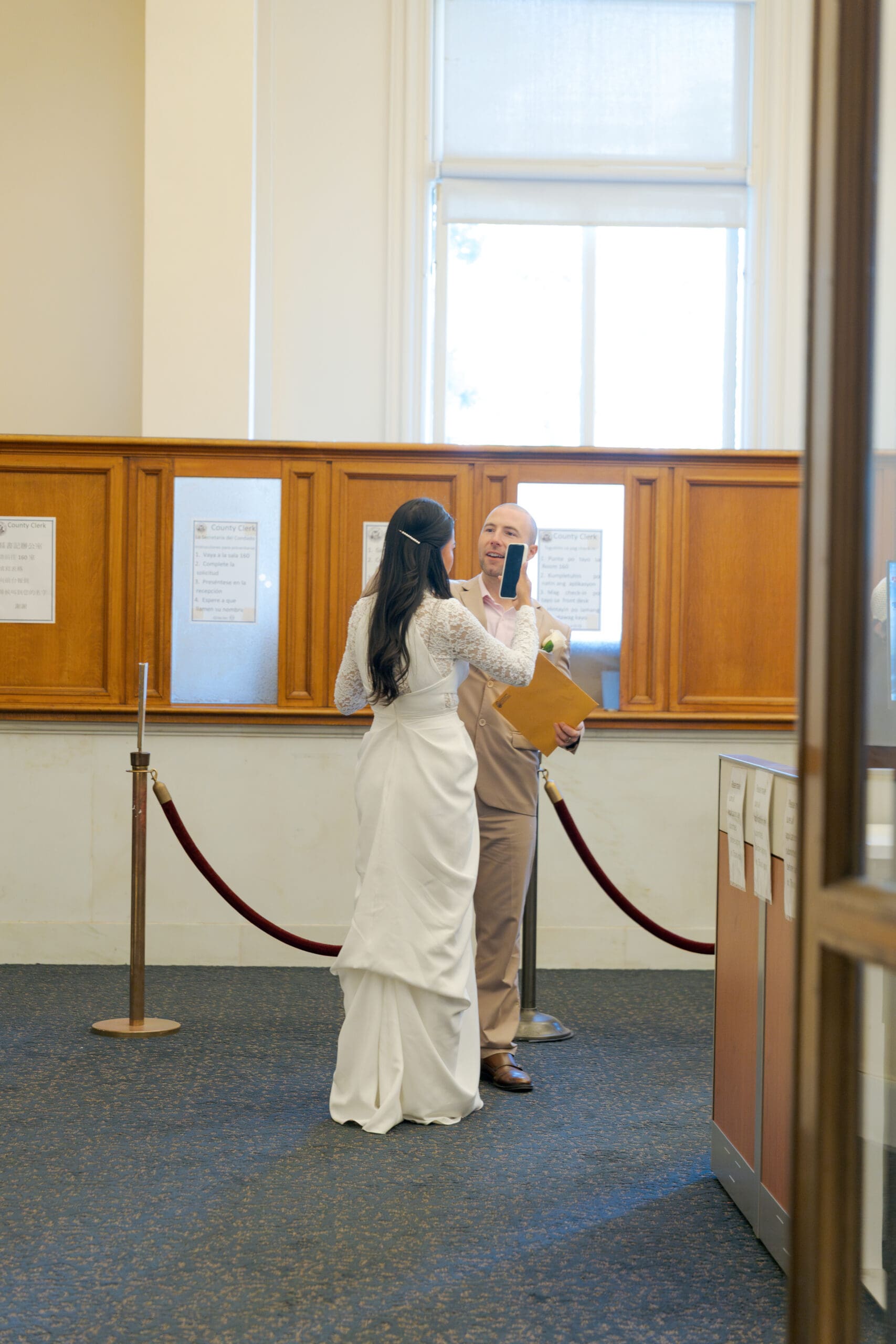 Checking in at the Clerk's Office for their SF City Hall Wedding Appointment