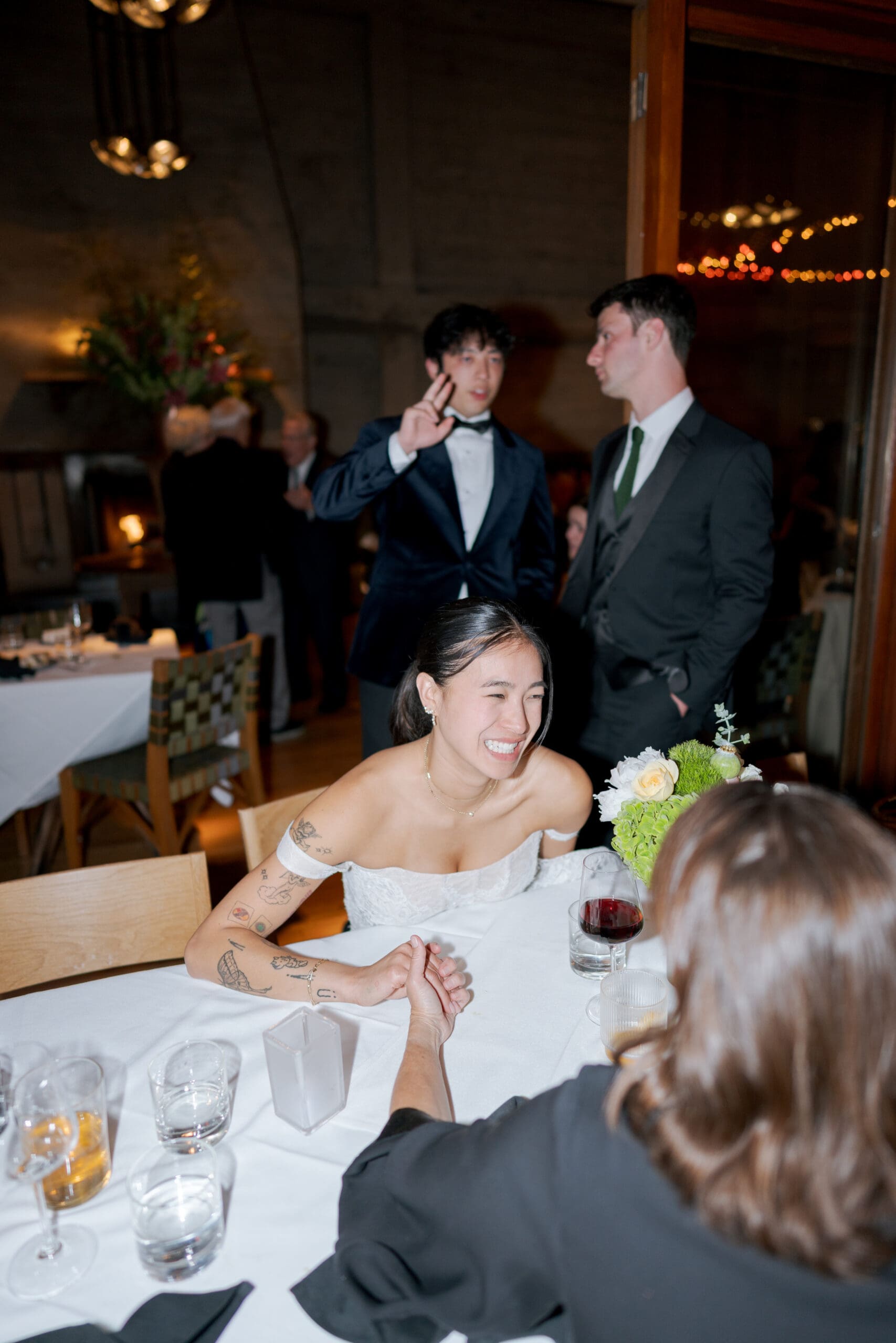 Bride and Groom greeting guests before dance floor opens at Foreign Cinema