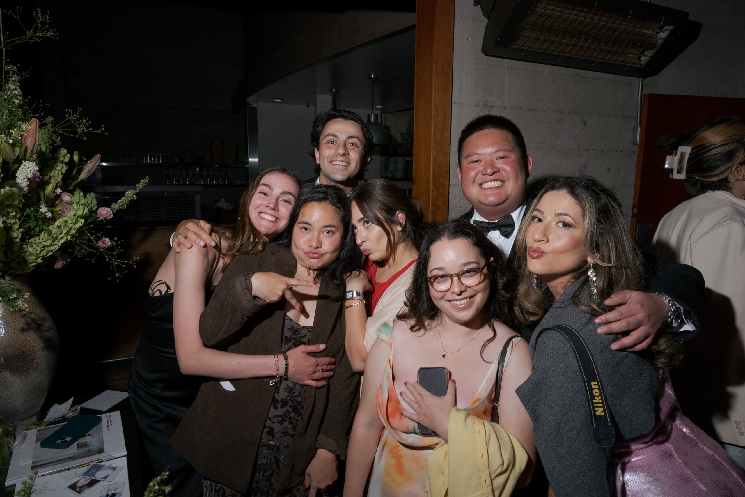 Friends celebrating the happy couple at Foreign Cinema