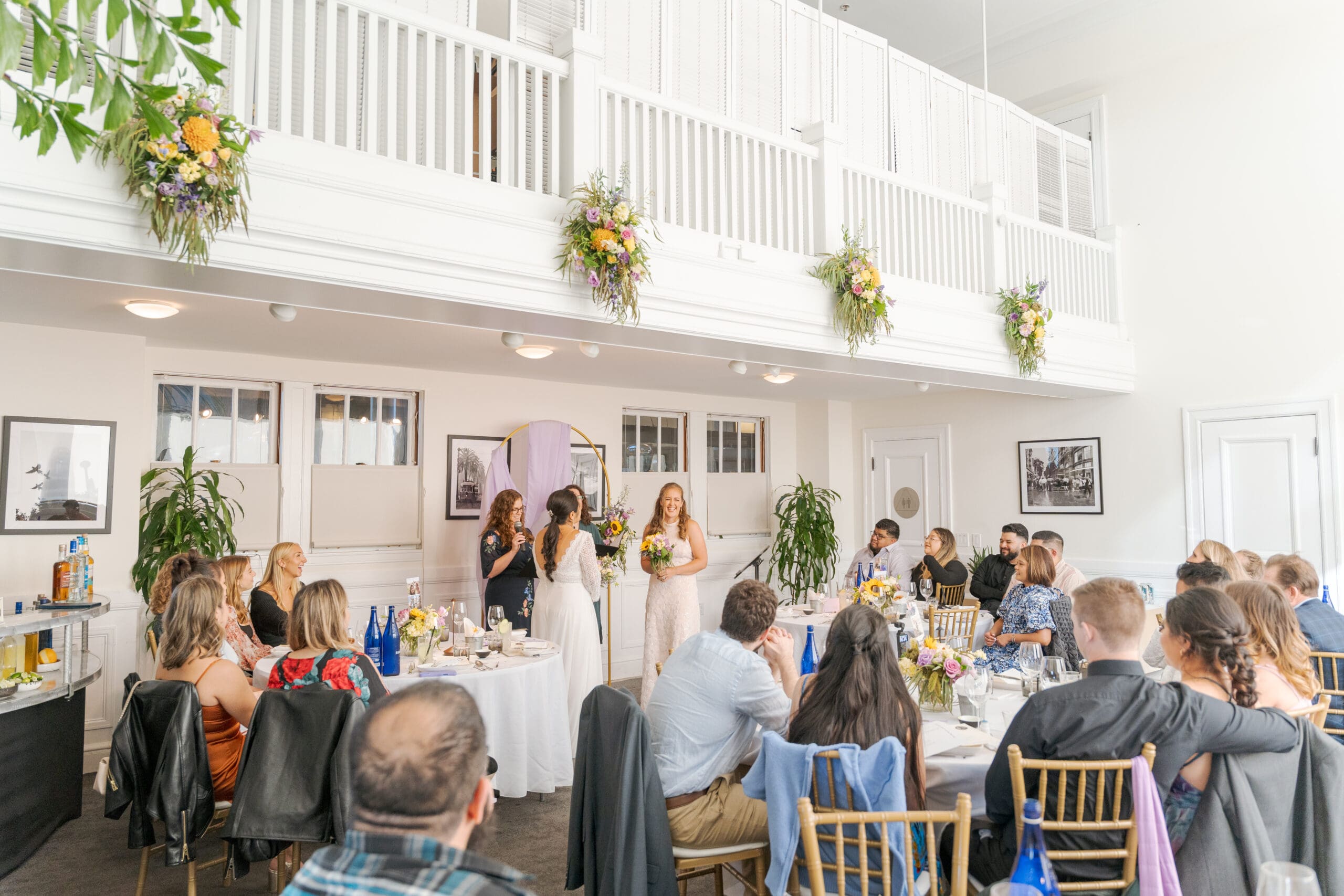 Surrounded by their closest friends and family during their wedding vows 
