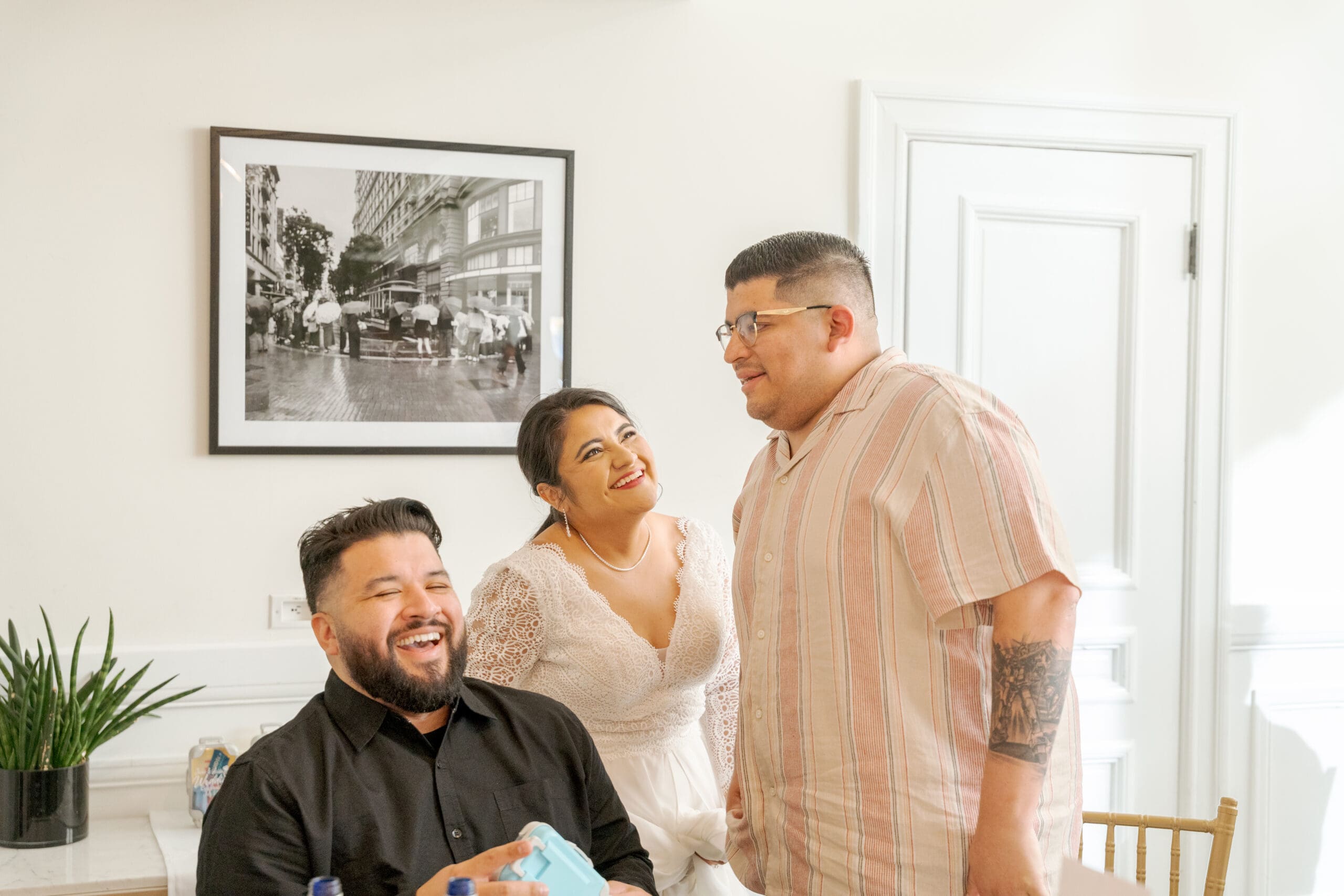 Bride greeting loved ones during wedding reception in San Francisco