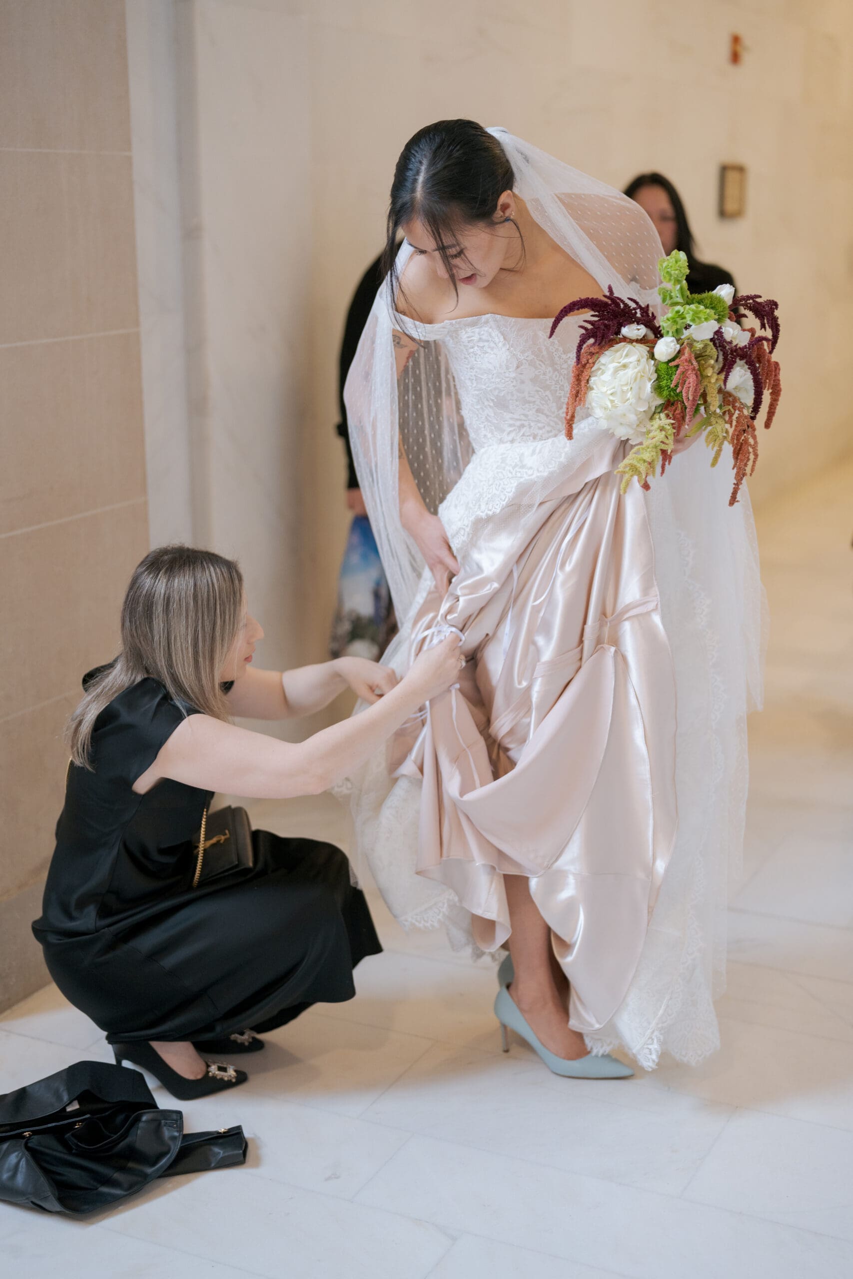 Teal shoes and white wedding dress with long veil at San Francisco City Hall