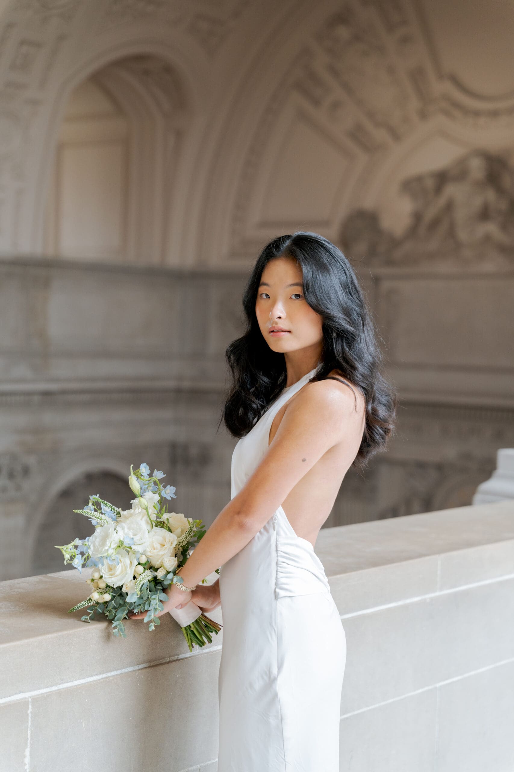 Bride's open back dress at San Francisco City Hall