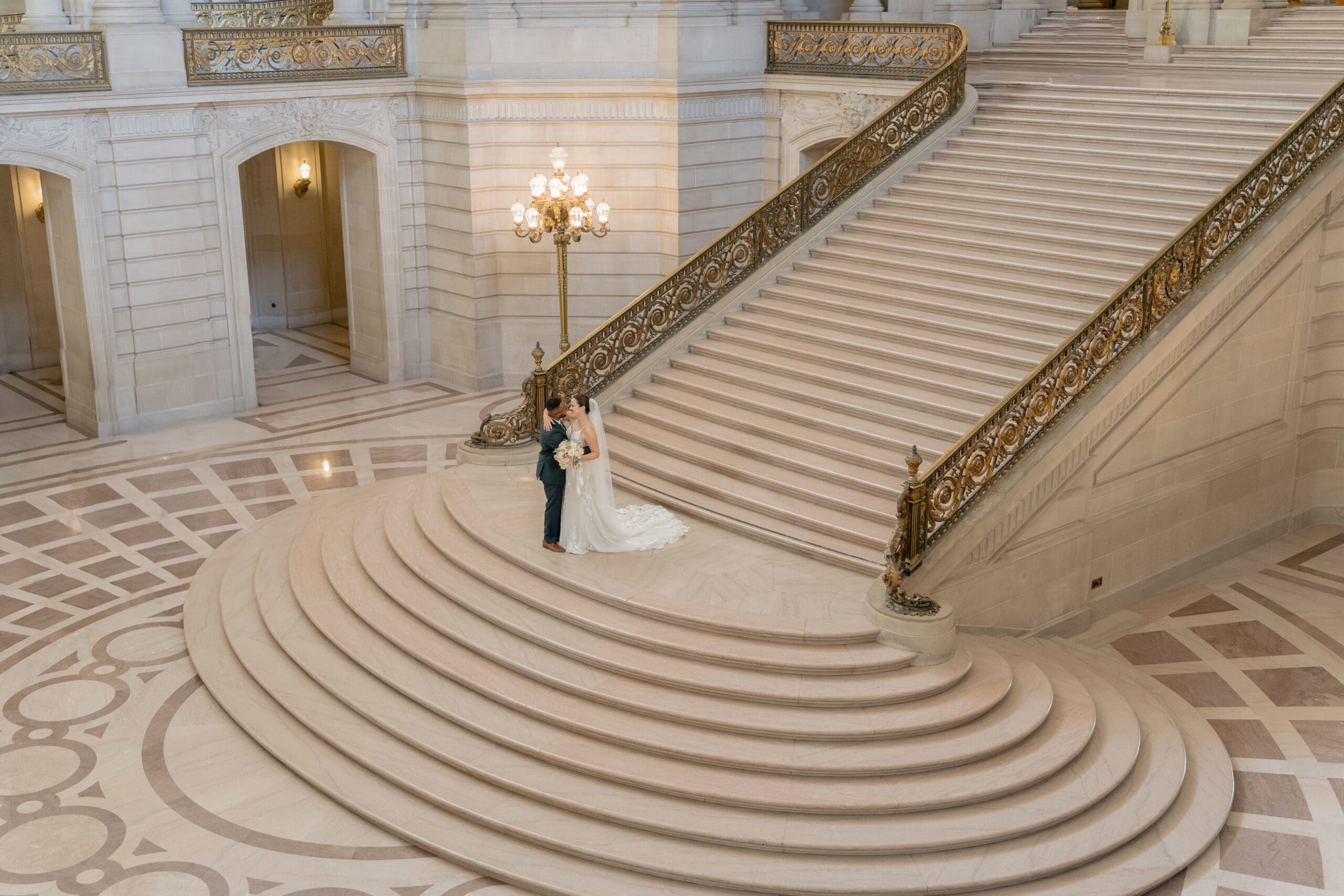 Bride and Groom slow dance on the Grand Staircase of San Francisco City Hall