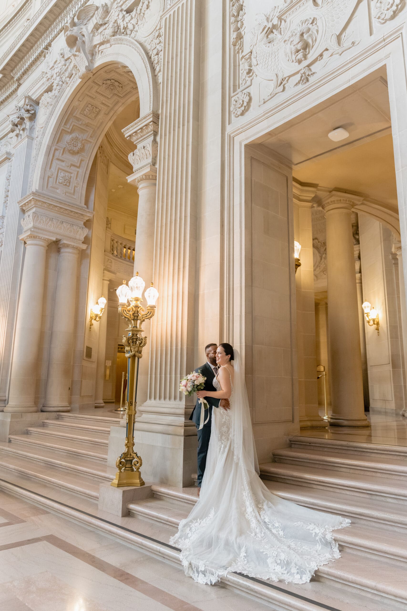 Wedding portraits at the rotunda of San Francisco City Hall, at the top of the Grand Staircase