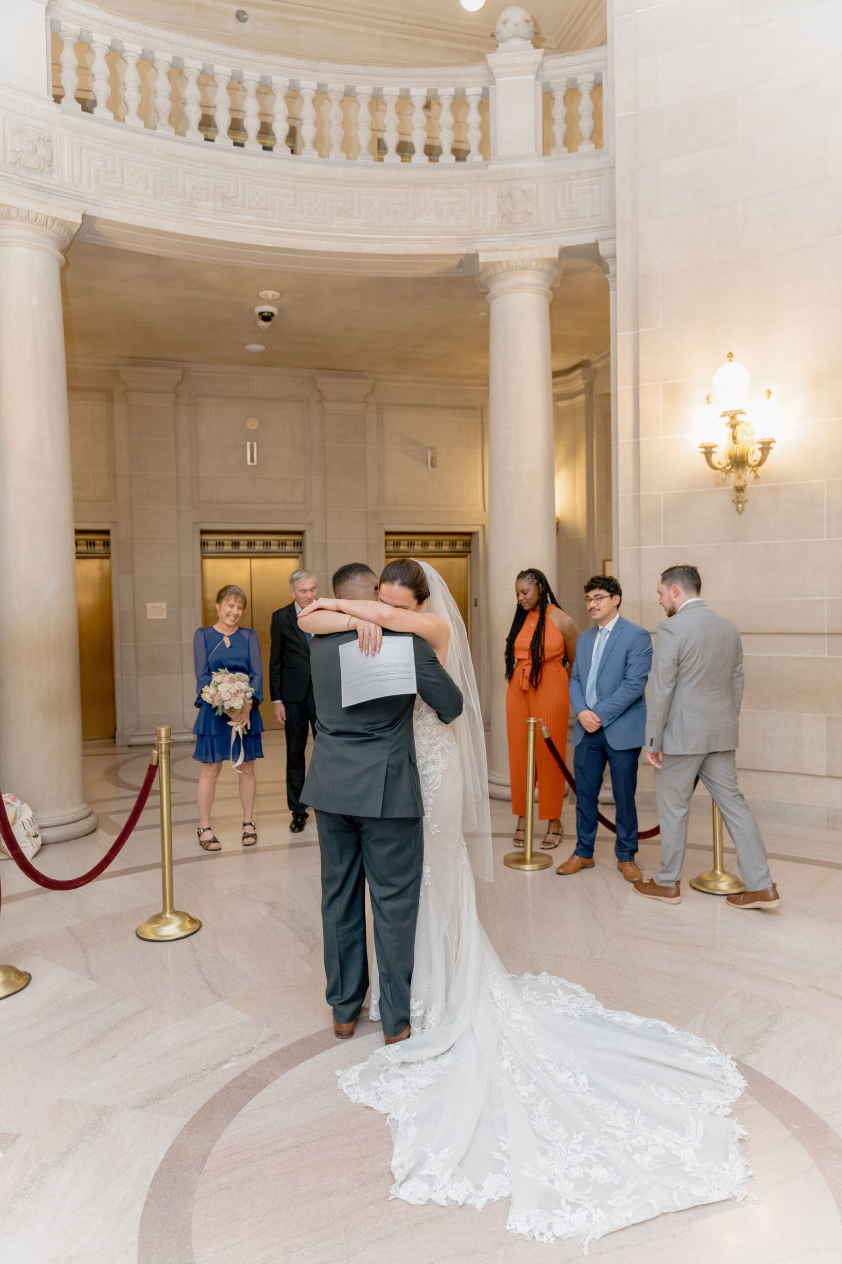 Bride and Groom in an emotional embrace after their San Francisco Civil Ceremony