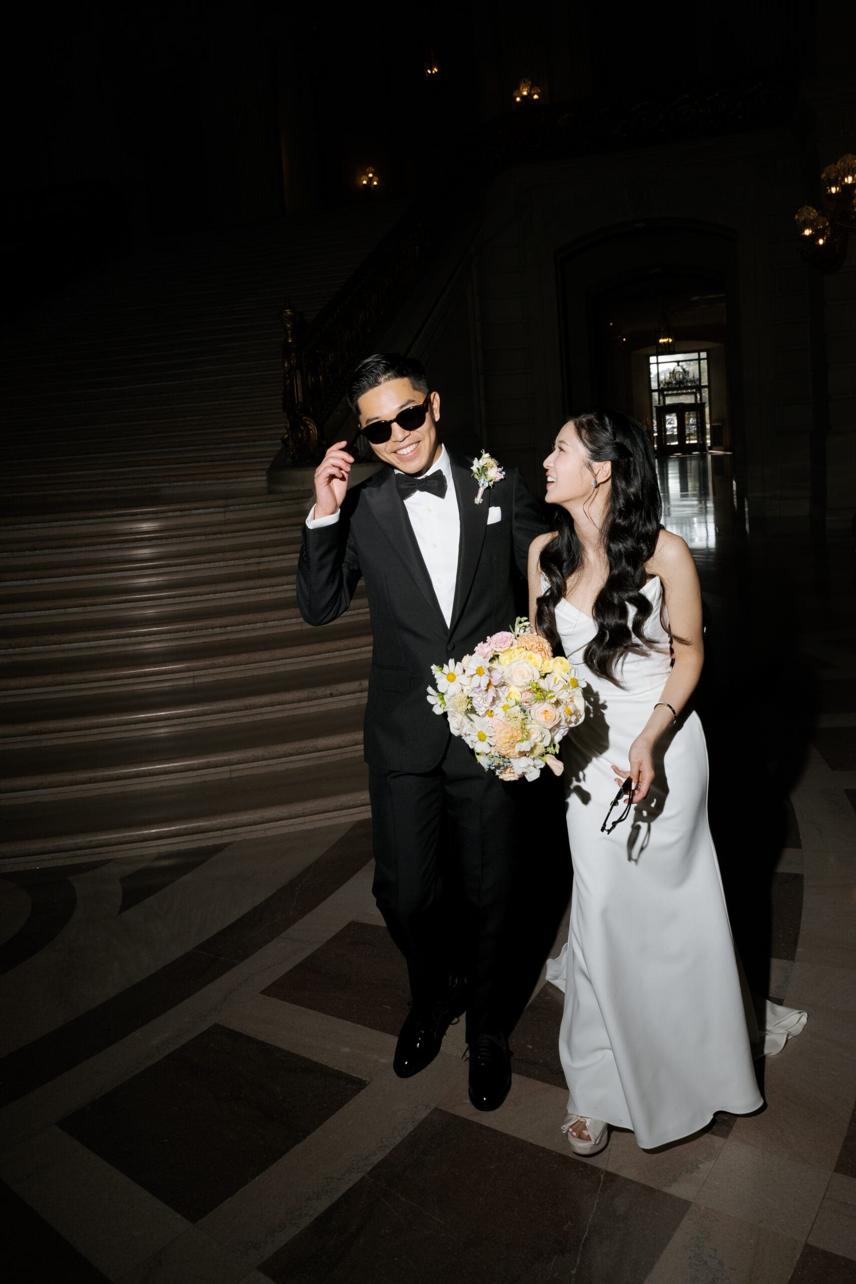 Direct flash photo of couple inside the main atrium of San Francisco City Hall
