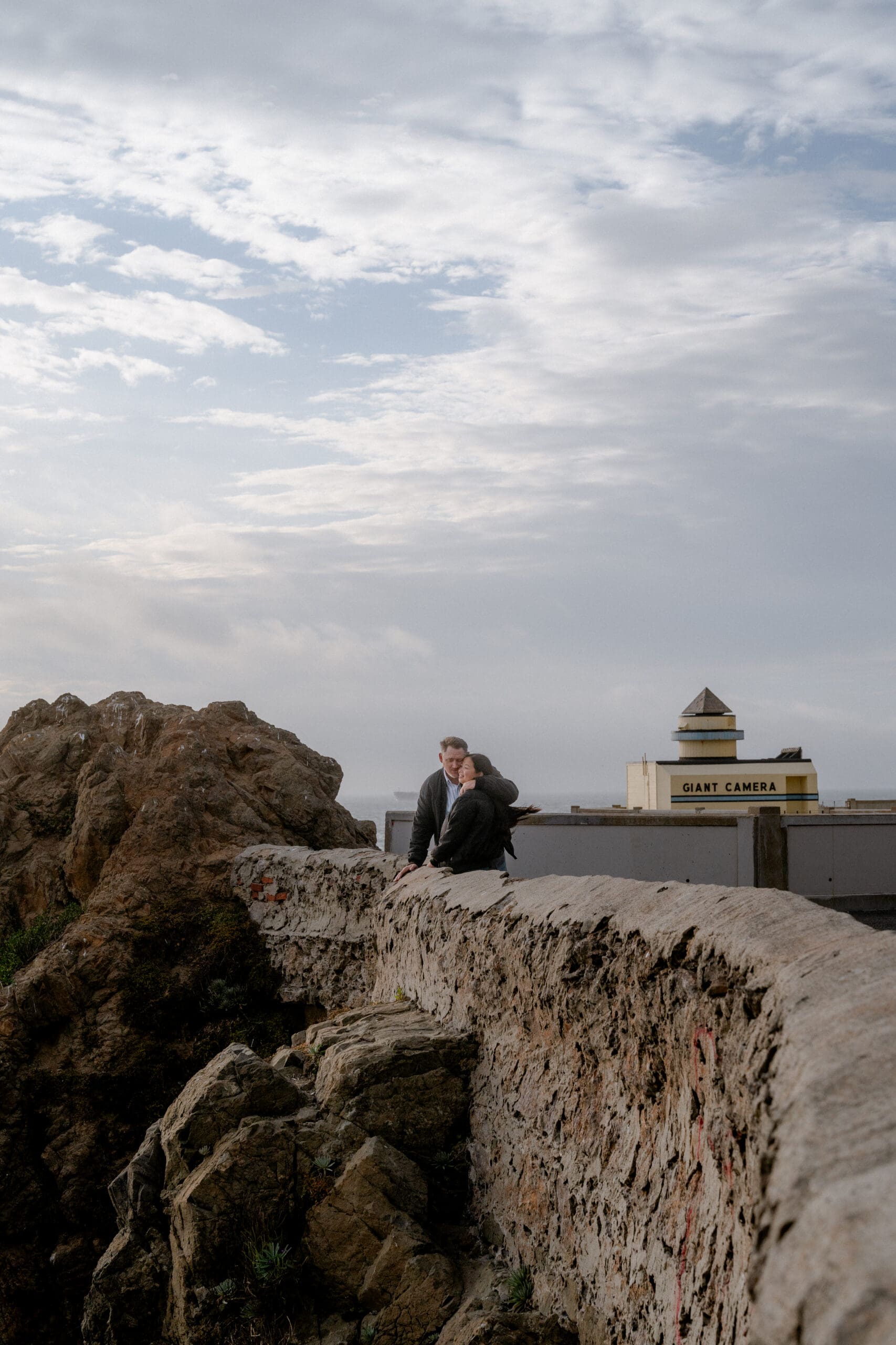 Couple's engagement shoot at Ocean Beach Cliffhouse in San Francisco