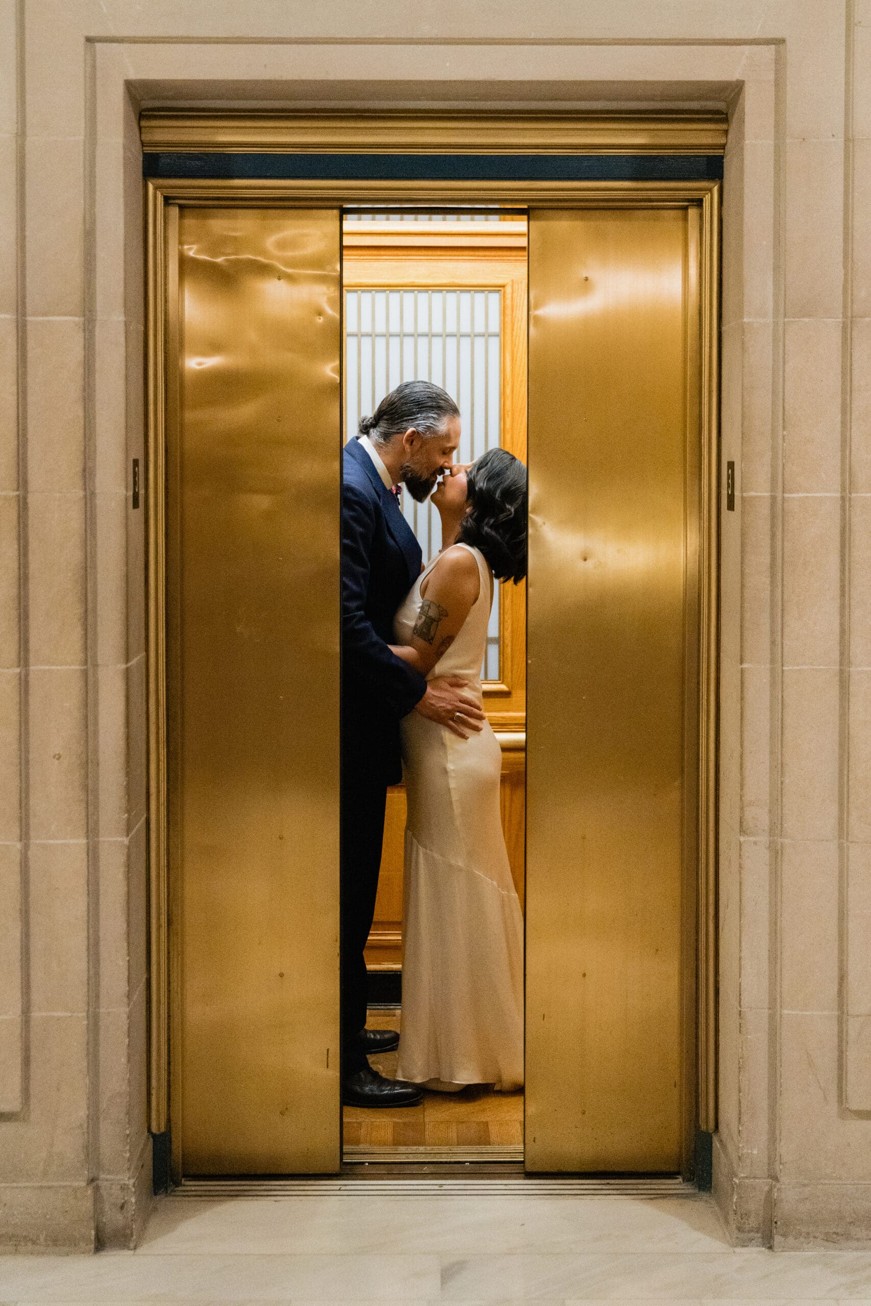 The iconic golden elevators in San Francisco City Hall