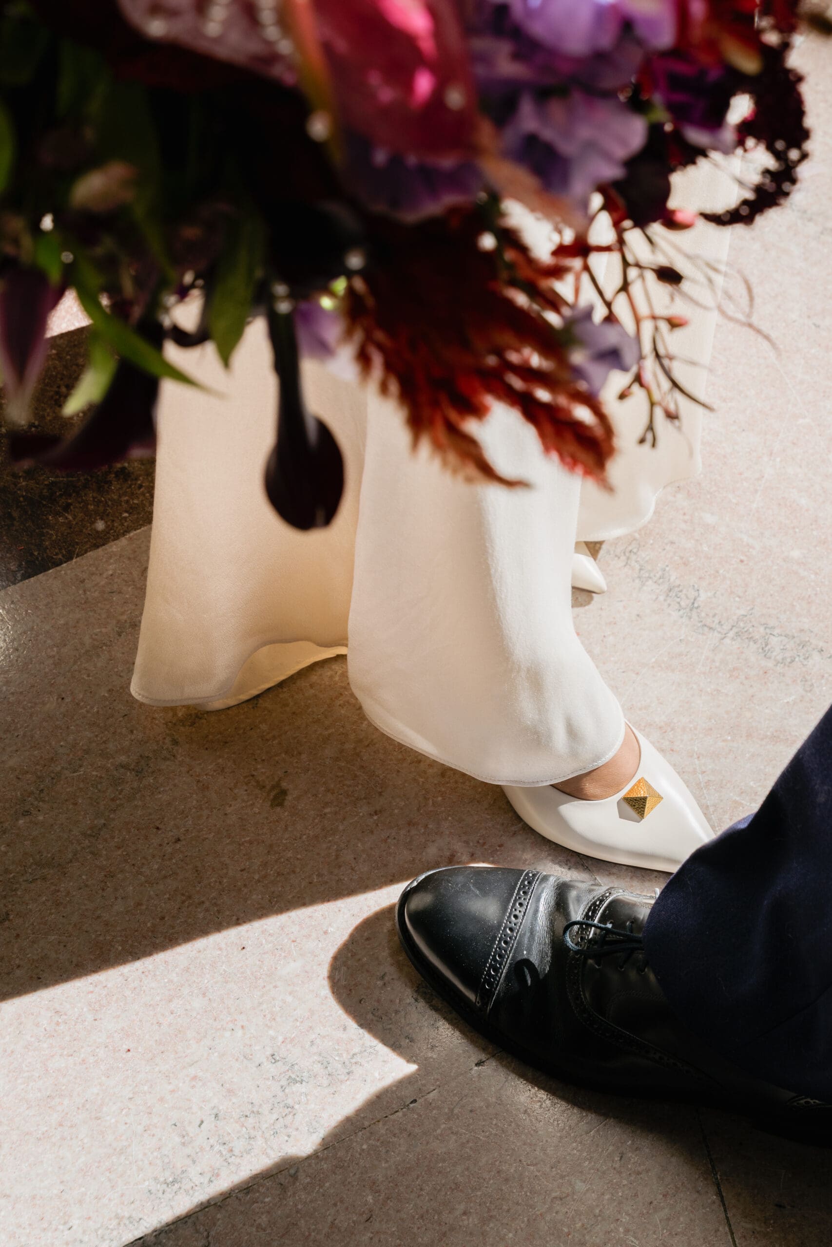 Editorial style wedding photo taken in the window light of SF City Hall