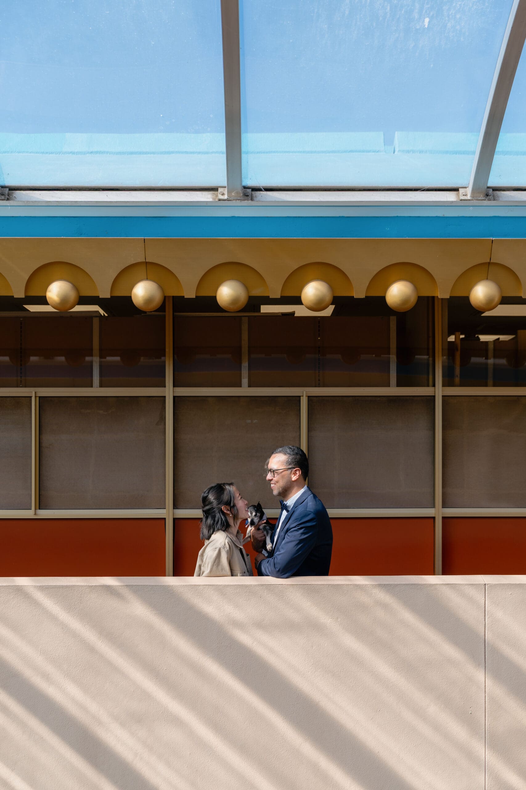 Symmetrical view of the circular geometric windows and walkways at Marin County Civic Center.
