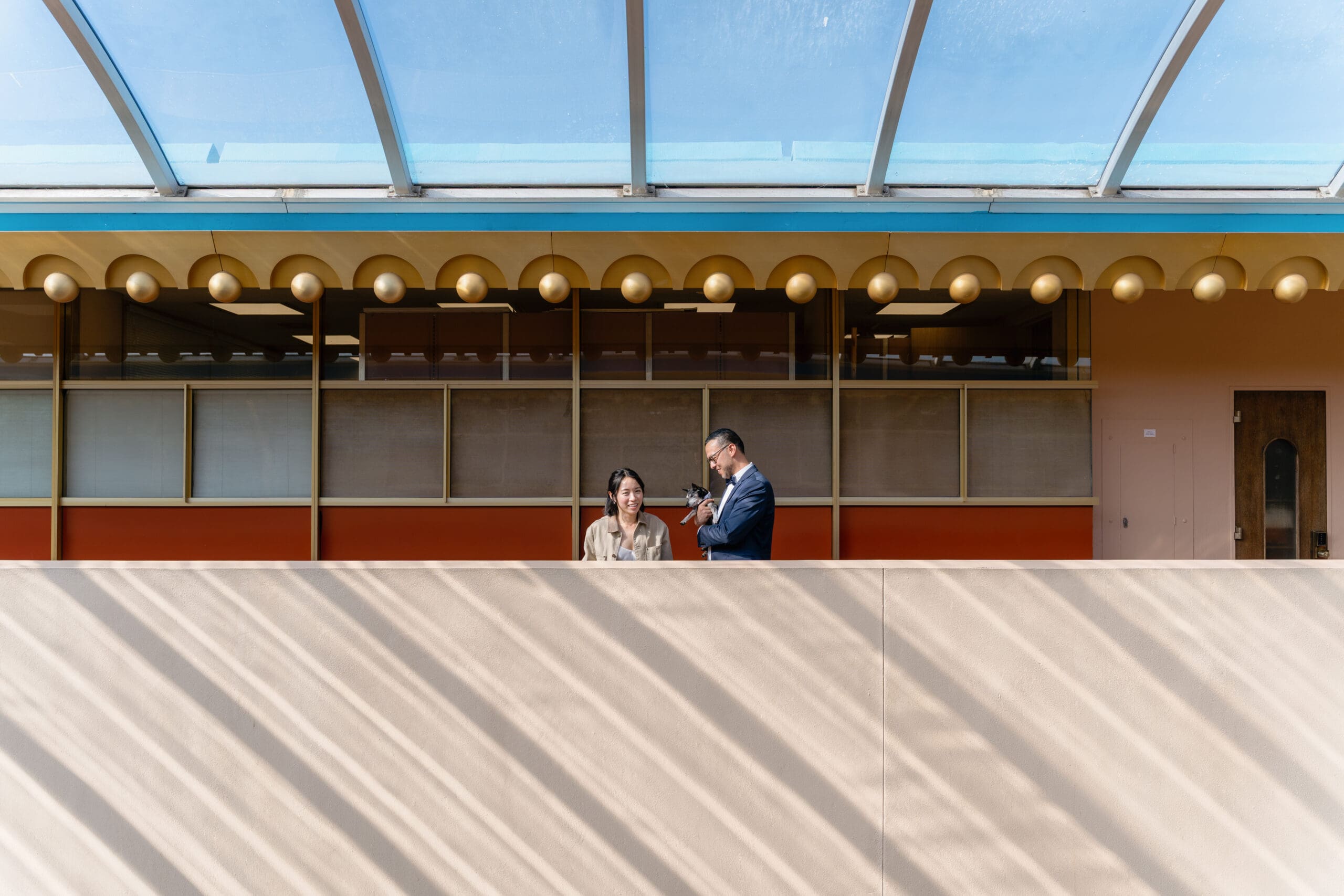 Wide angle shot of the Marin County Civic Center exterior with blue domes and colorful golden accents