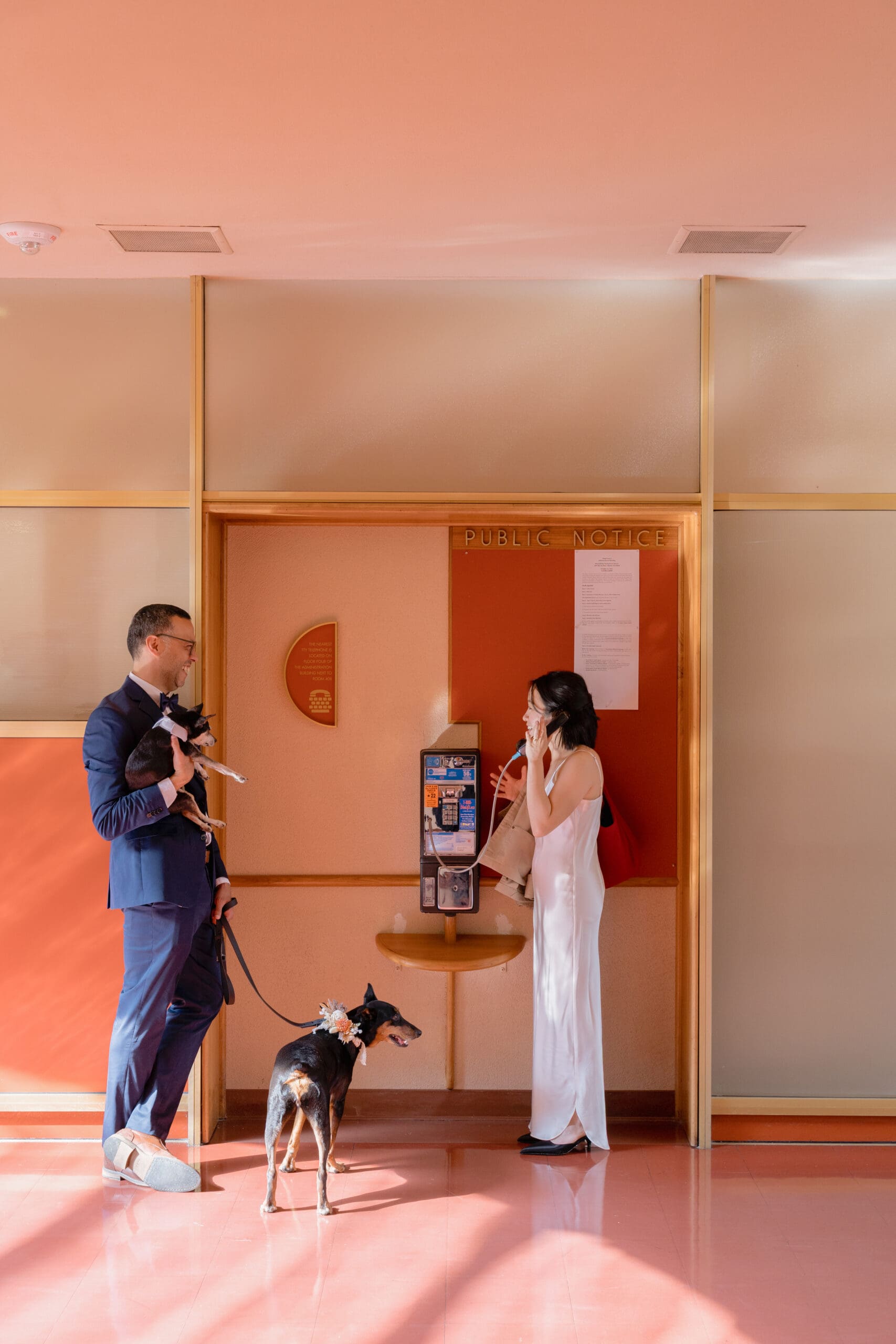 Candid wedding photo of couple in Marin County Civic Center after their marriage ceremony