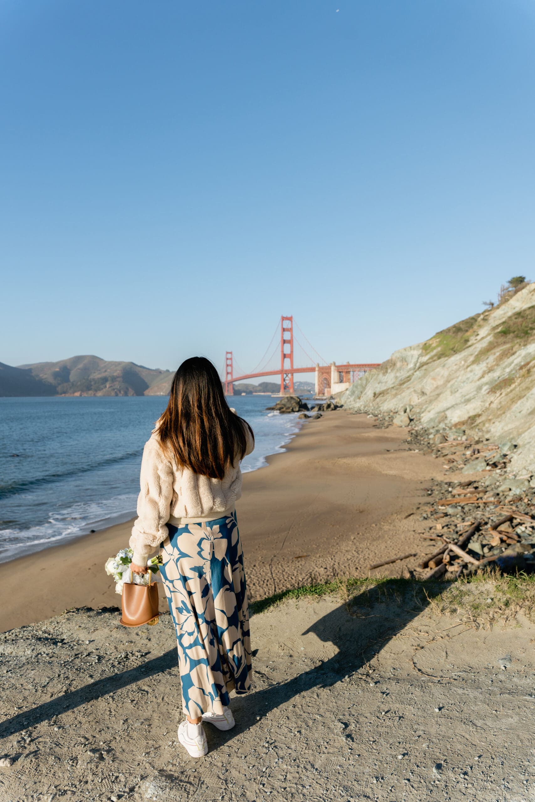 Wedding party arriving at the rugged cliffs and serpentine rock of Marshall's Beach.