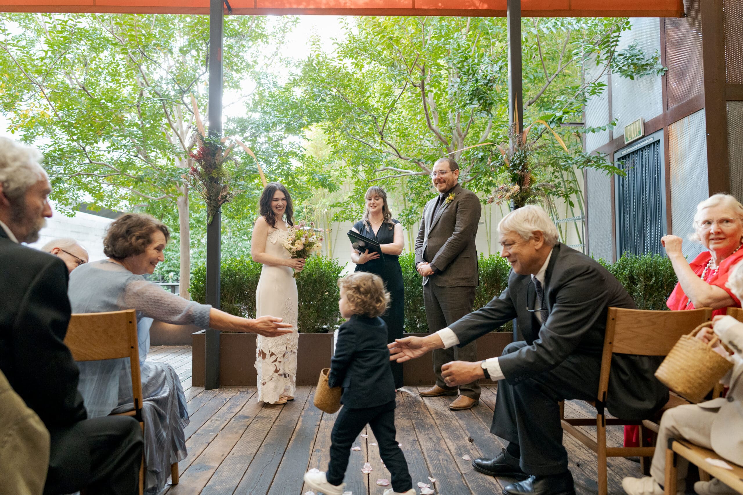 Candid moment during a wedding ceremony at Comal in downtown Berkeley.