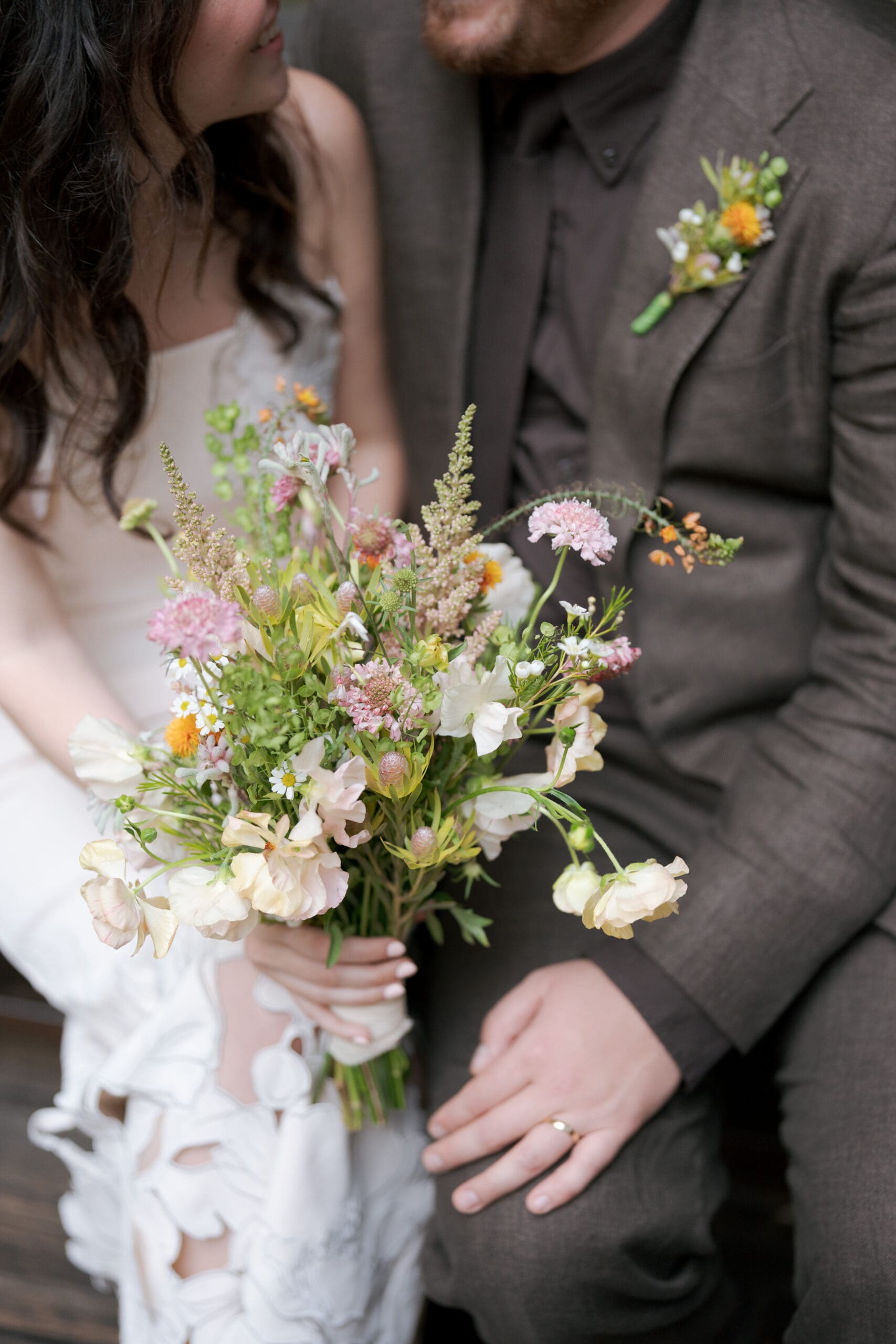 Editorial wedding portrait of a couple in the industrial-chic courtyard at Comal Berkeley.