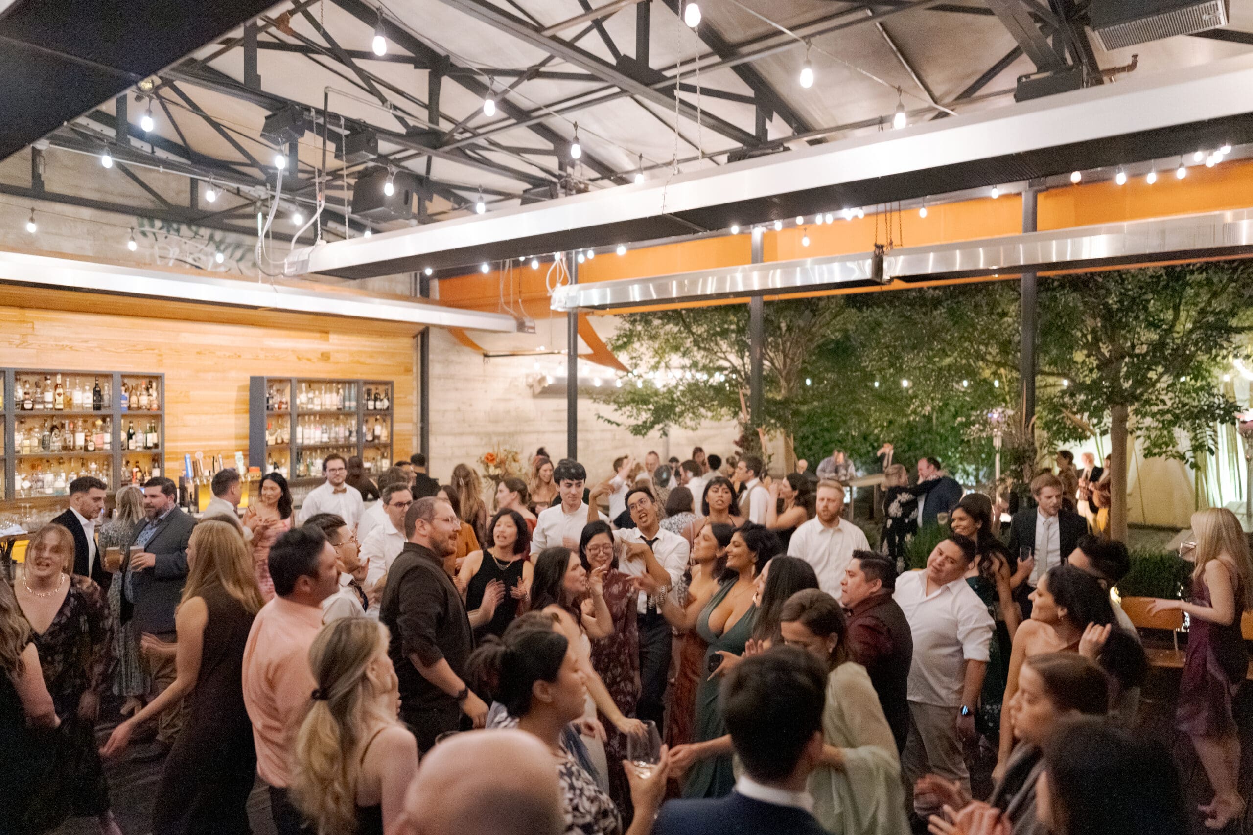 Candid photography of guests on the dance floor at Comal in Berkeley.