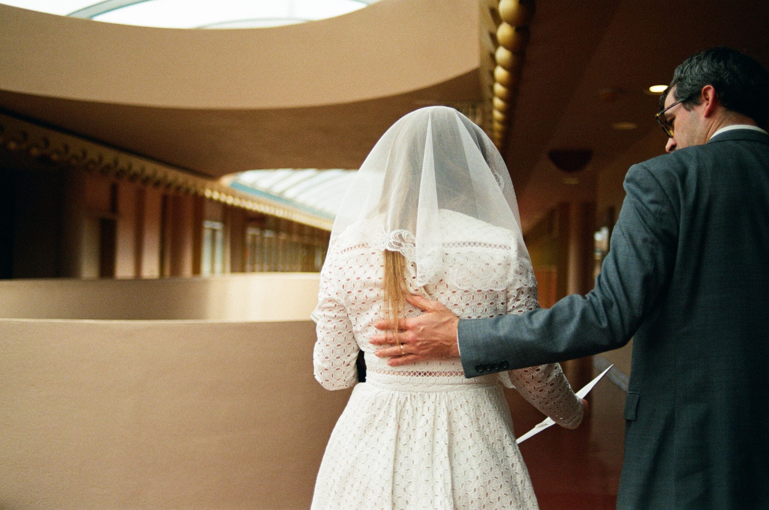 Intimate moments between newlyweds at the Marin County Civic Center on Kodak portra 800