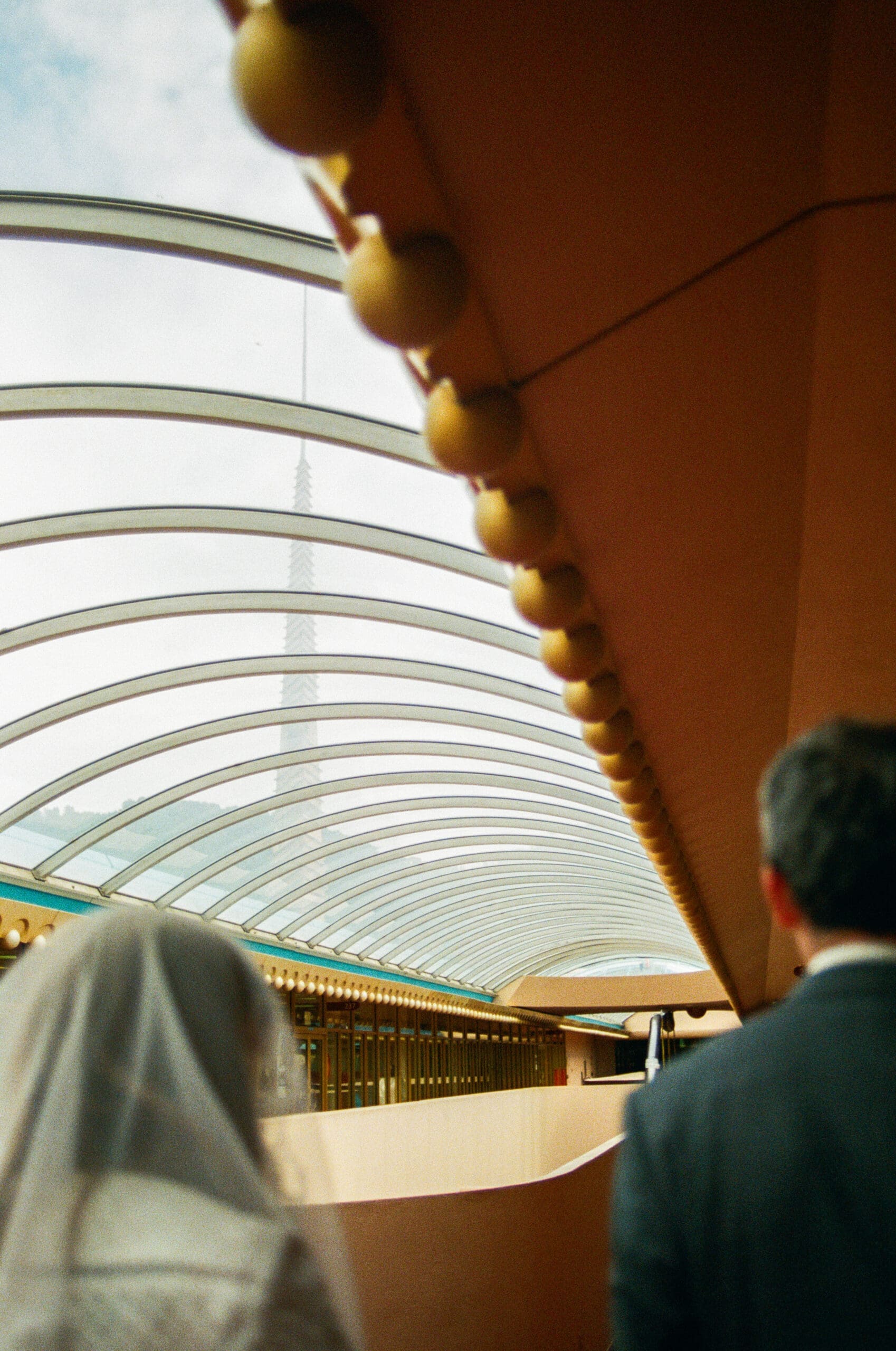 The iconic spire and golden orbs of the Marin County Civic Center after their marriage ceremony photographed on Kodak Portra