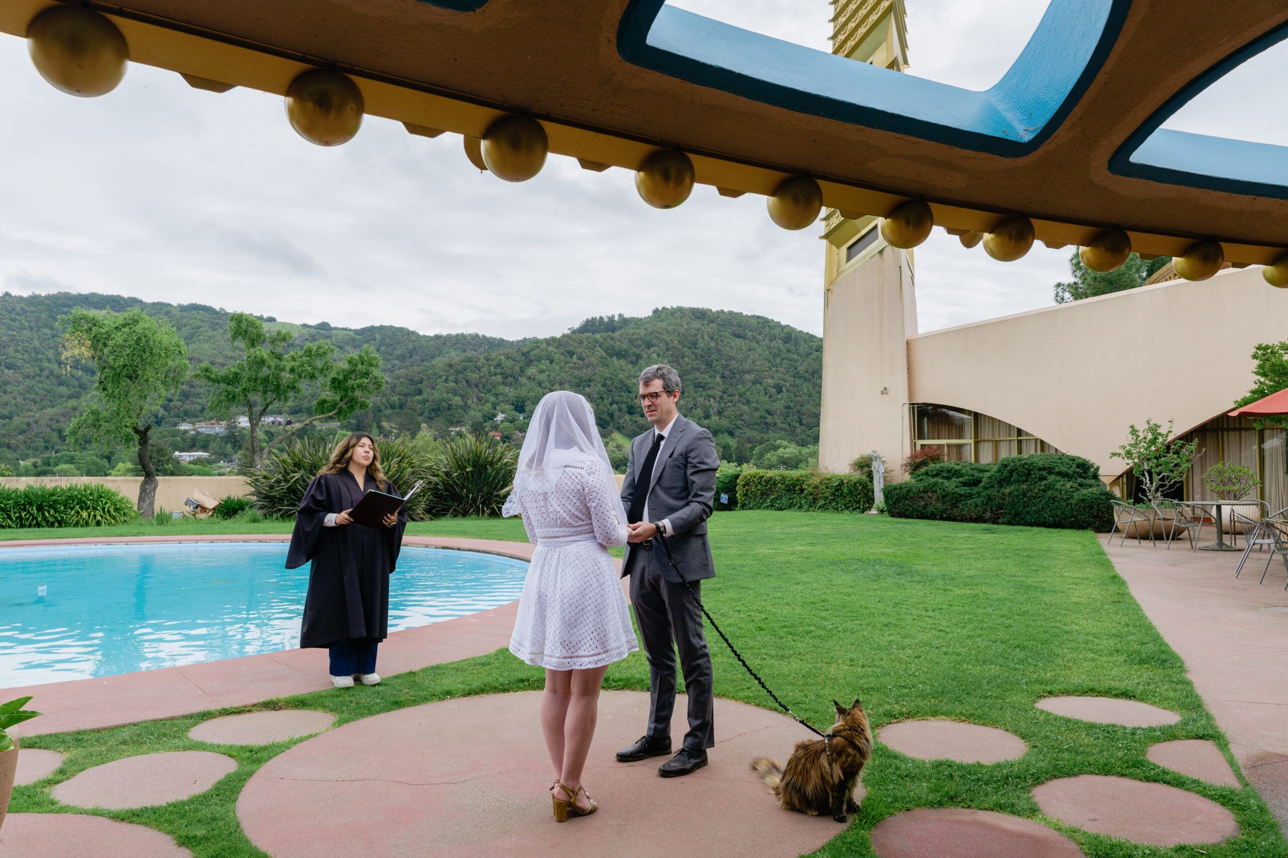Small, intimate wedding ceremony in the garden pool area of Marin County Civic Center