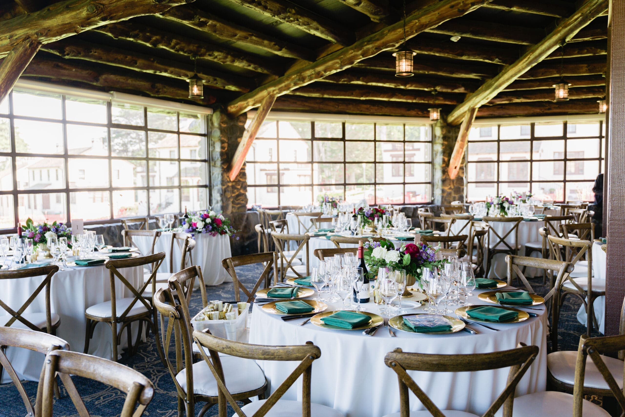 Reception tables setup inside the Wedgewood Presidio Log Cabin