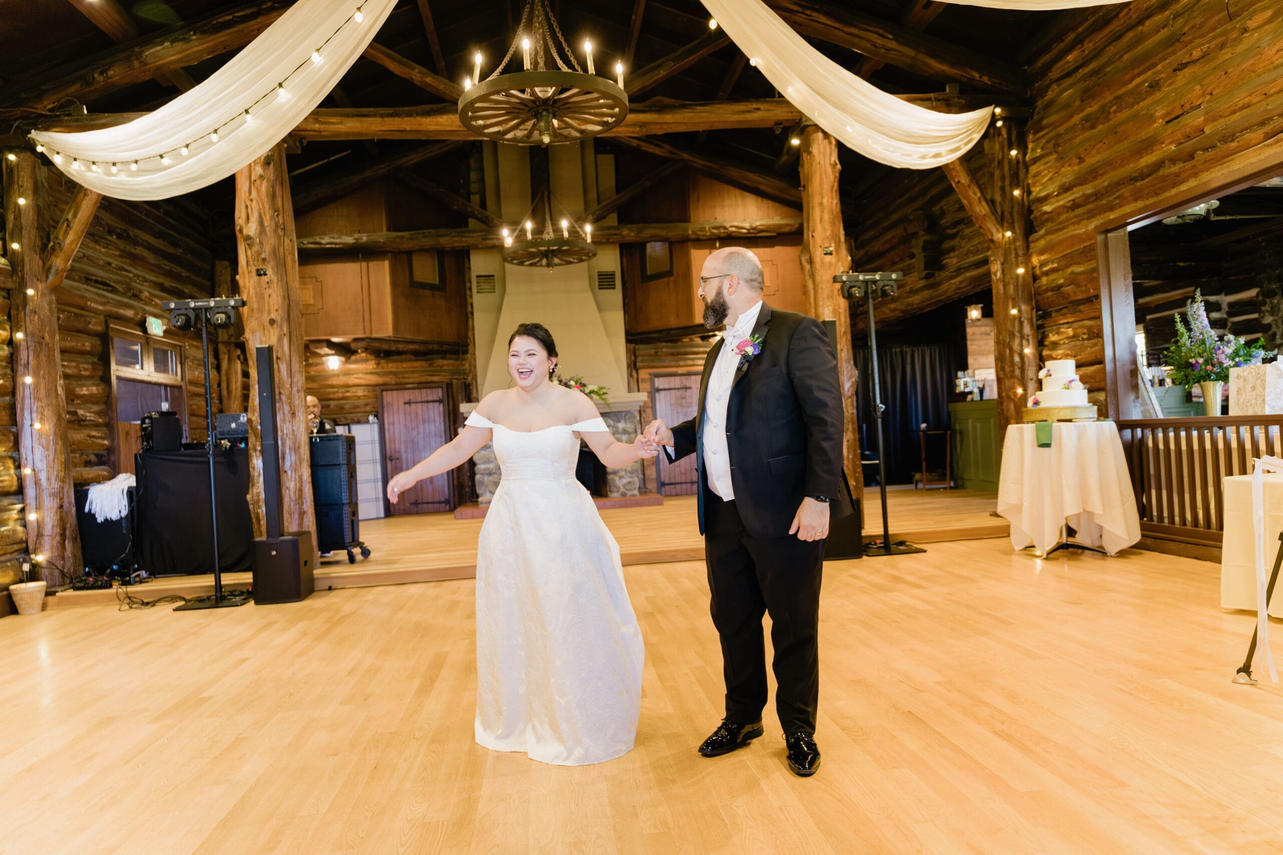 Newlywed couple's first dance inside the San Francisco Presidio Log Cabin