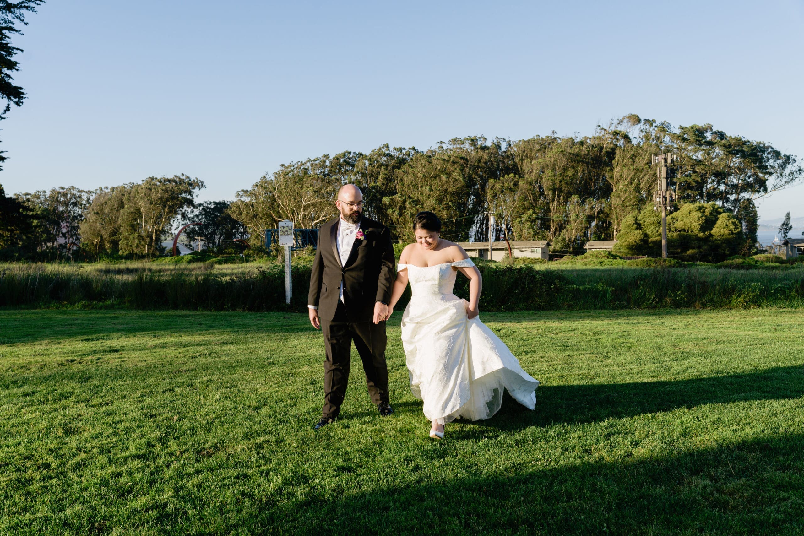 Newlyweds during golden hour in the San Francisco Presidio
