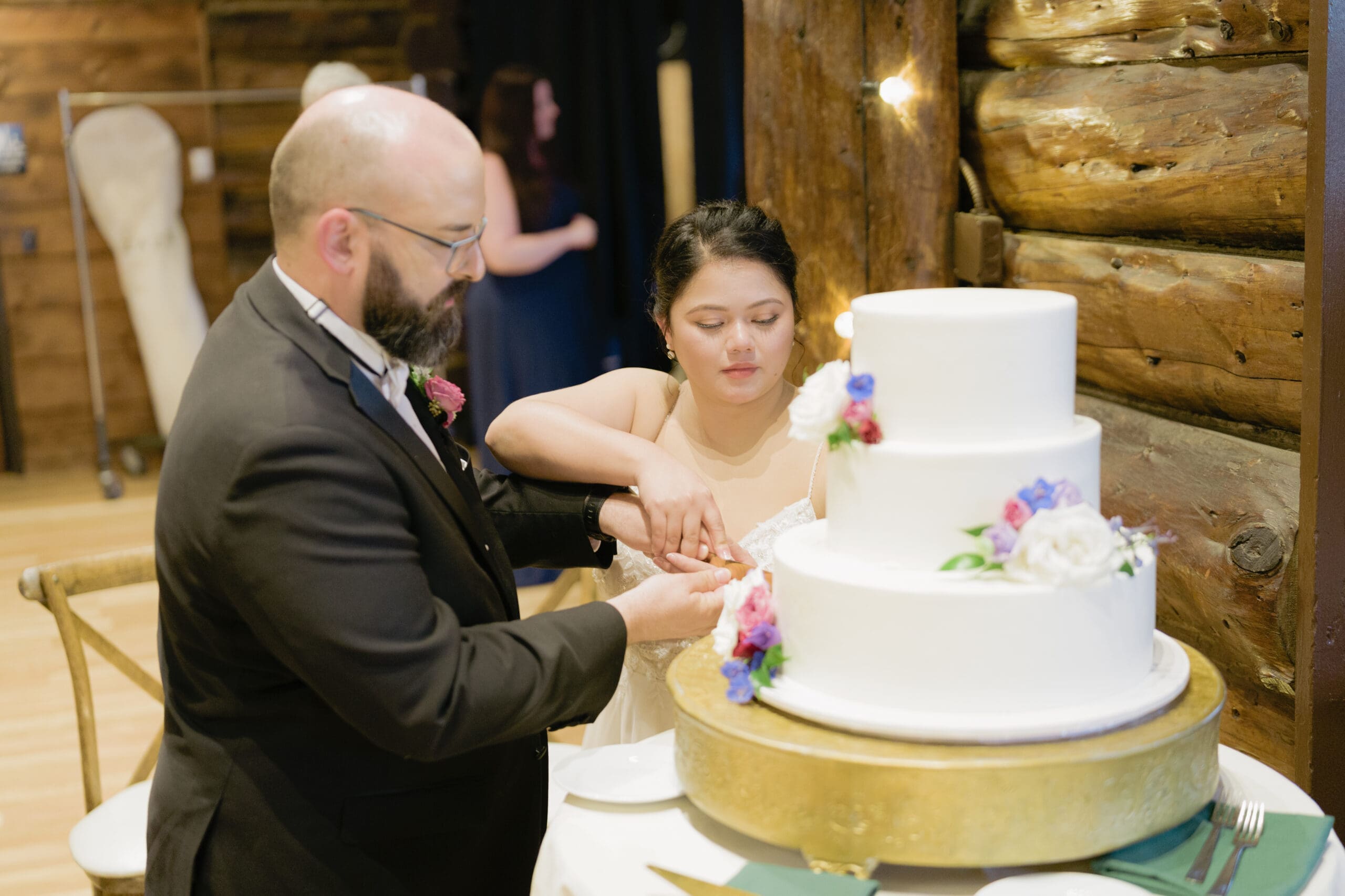 Cutting the Cake during their reception
