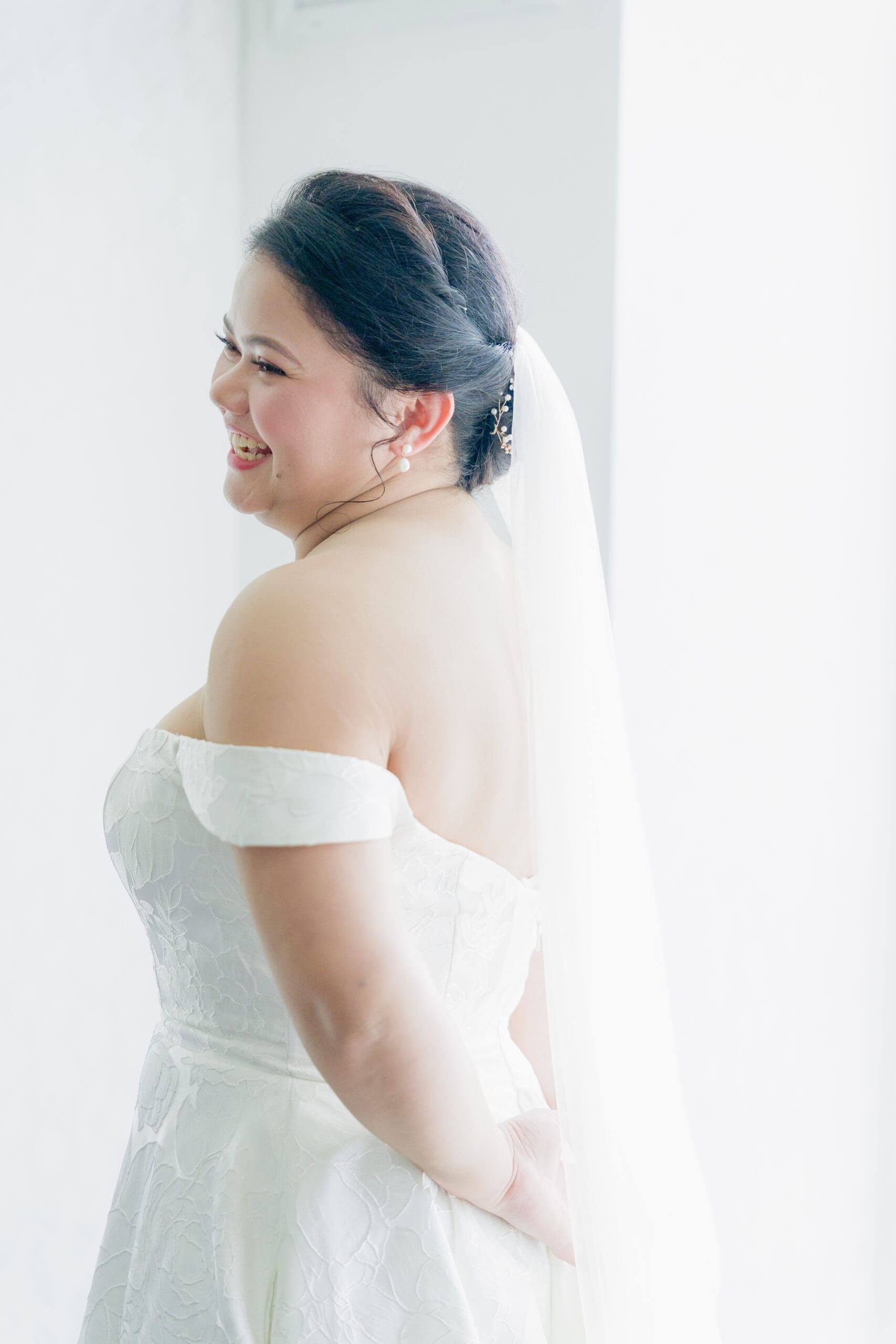 Smiling bride after getting ready at the hotel in SF