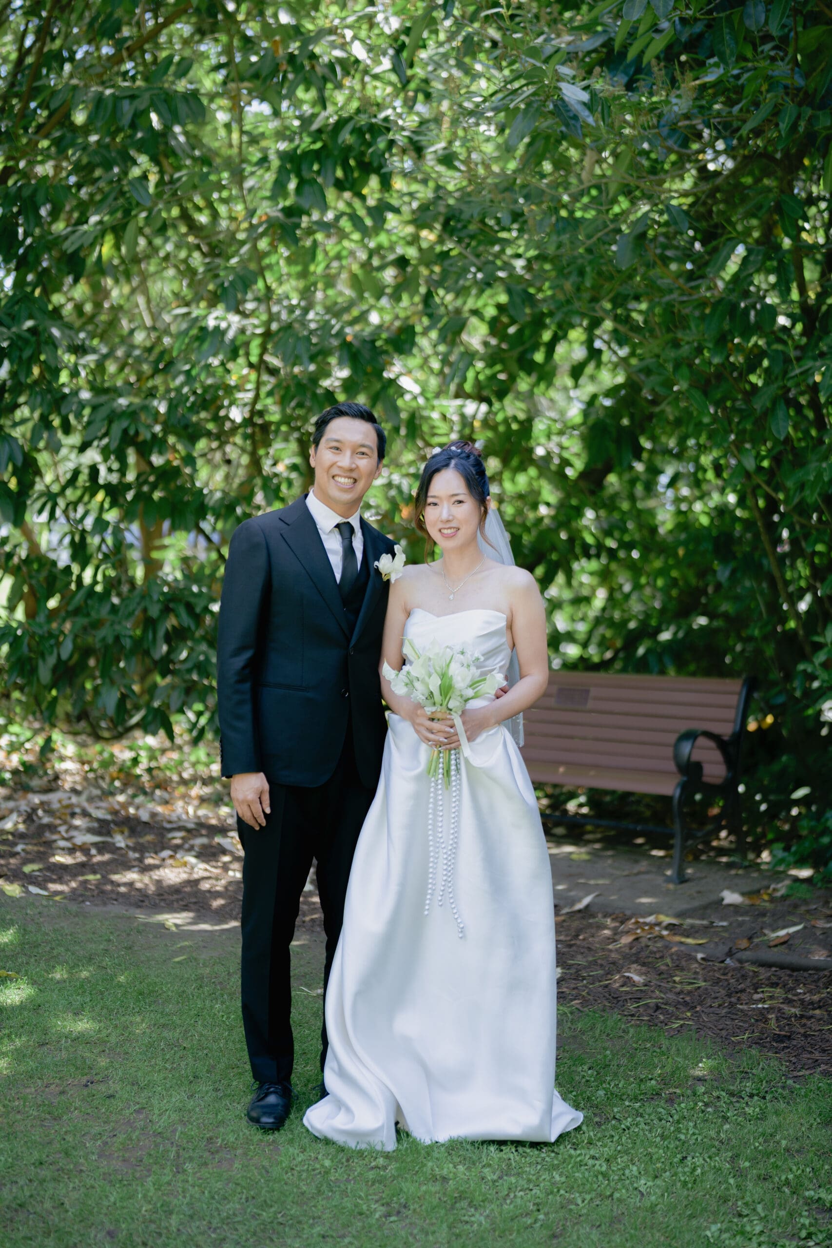 Formal portrait of bride and groom in the Shakespeare Garden