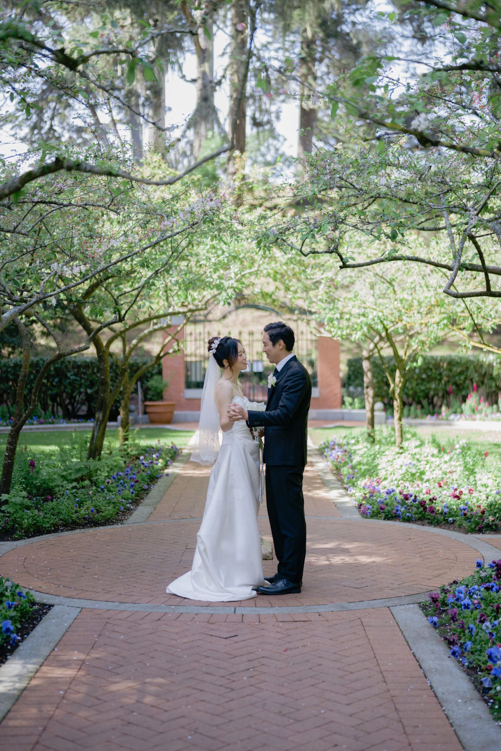 Bride and groom share a quiet moment after their wedding ceremony in Golden Gate Park's Shakespeare Garden