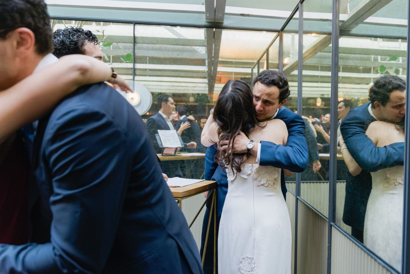 Emotional guest reactions during a private wedding ceremony on the upper level of The Progress San Francisco
