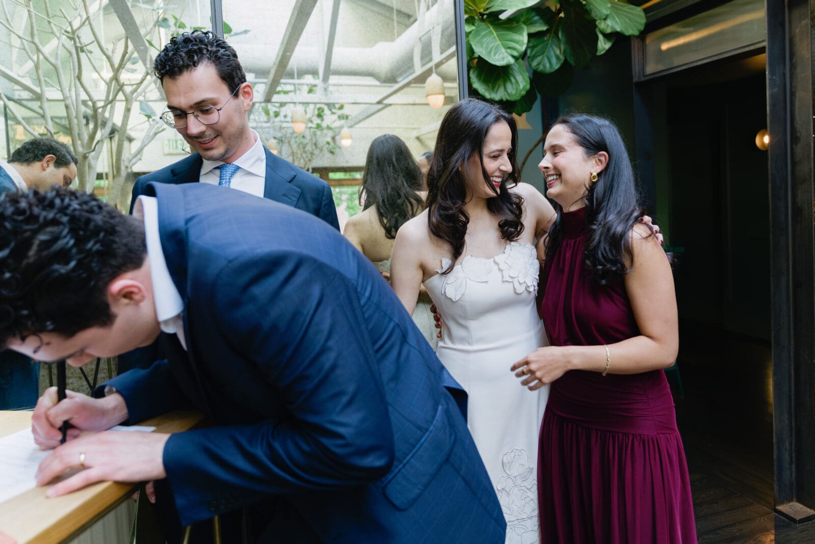 Signing the marriage license after intimate micro wedding at The Progress SF Michelin Star Restaurant