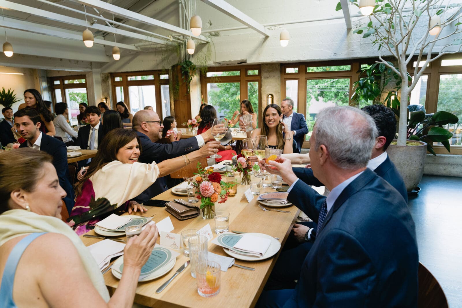 Unscripted moments during a wedding reception on the top floor private room of The Progress SF