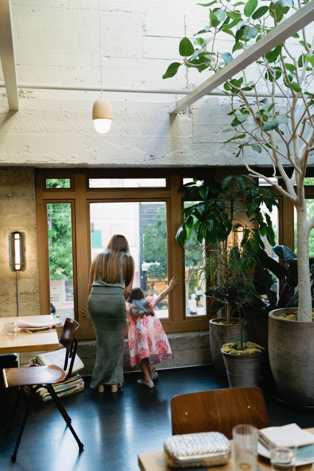 Candid moment captured documentary-style during micro wedding in The Progress SF restaurant