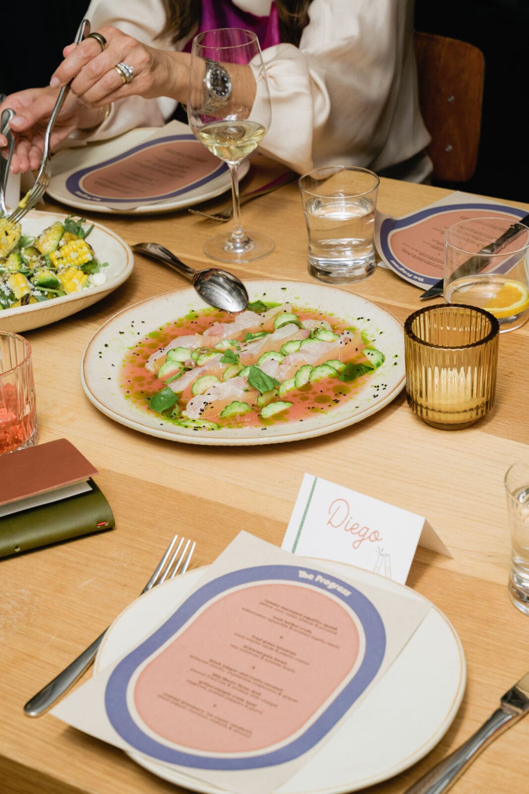 Family-style reception with Michelin Star dinner service at The Progress SF shot by San Francisco wedding photographer