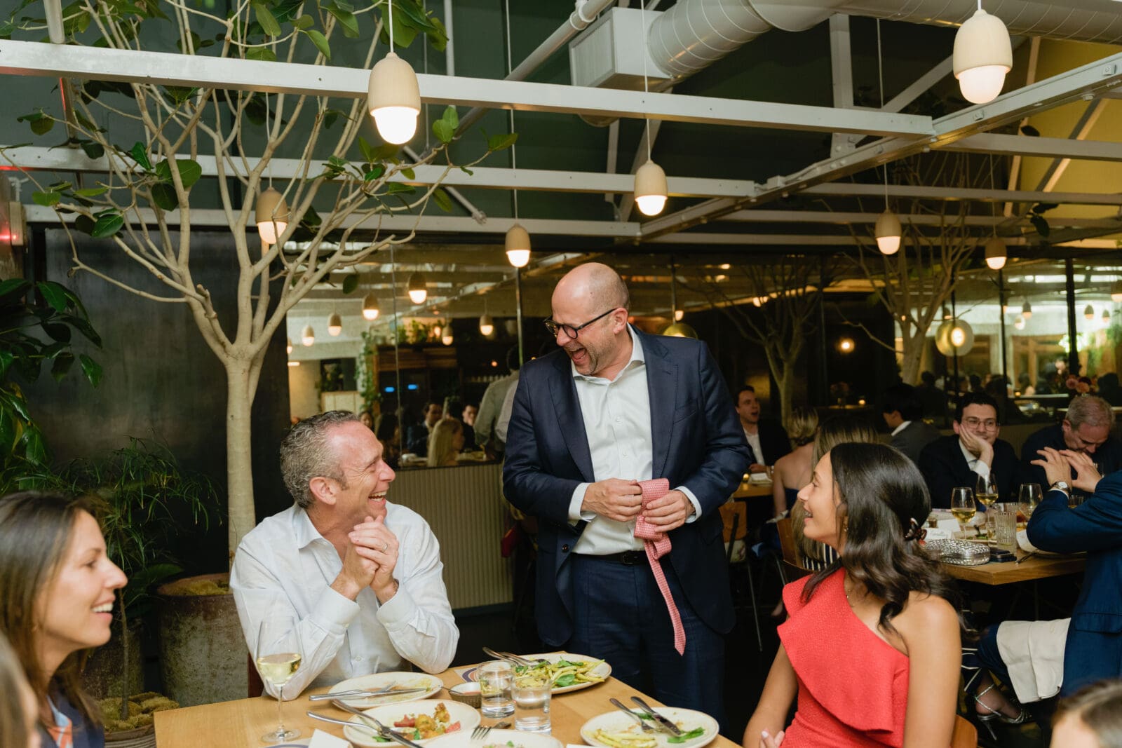 Laughter during a dinner reception at Michelin Star restaurant The Progress SF