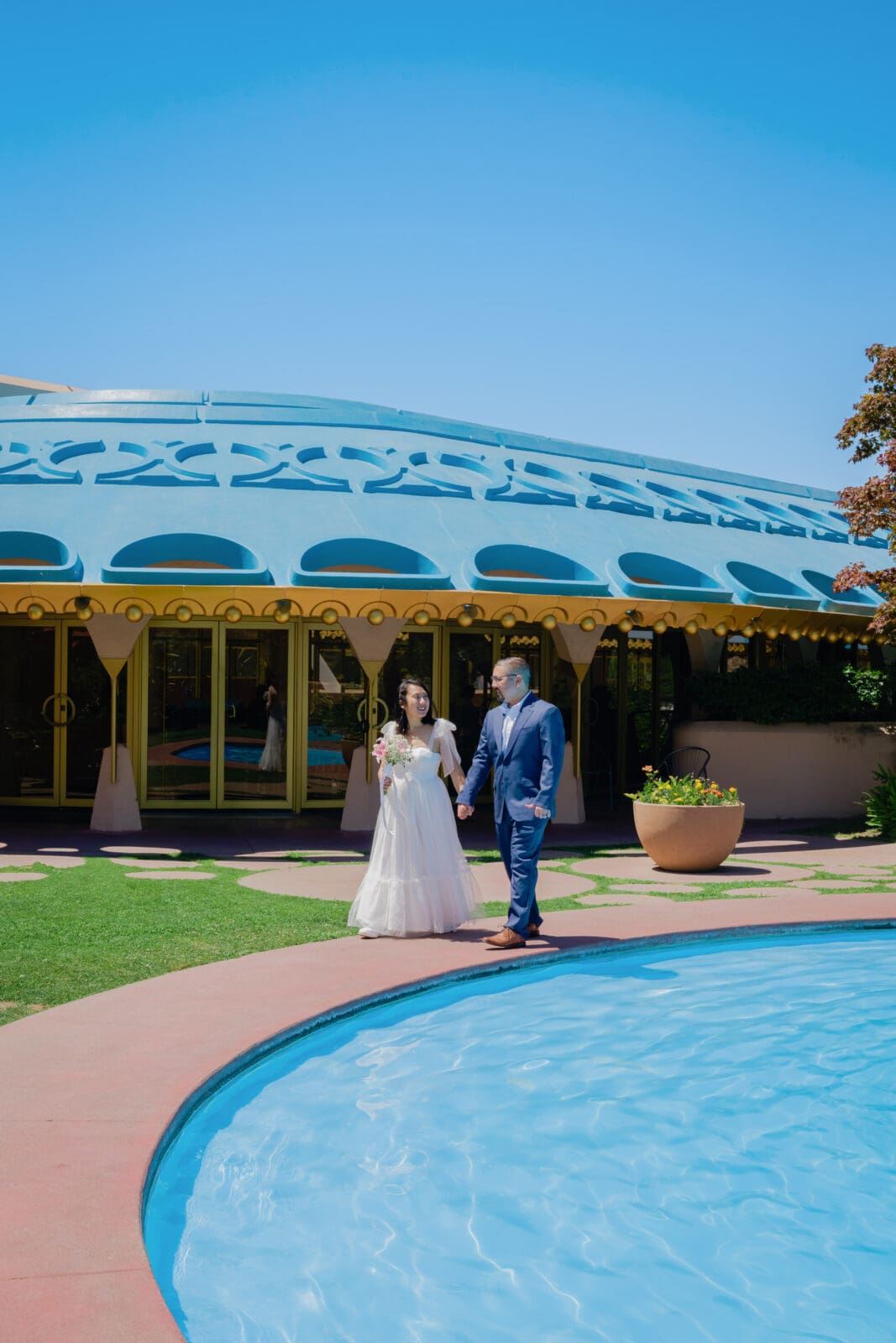 The outdoor garden and pool, with the iconic blue roofs, of Marin County Civic Center