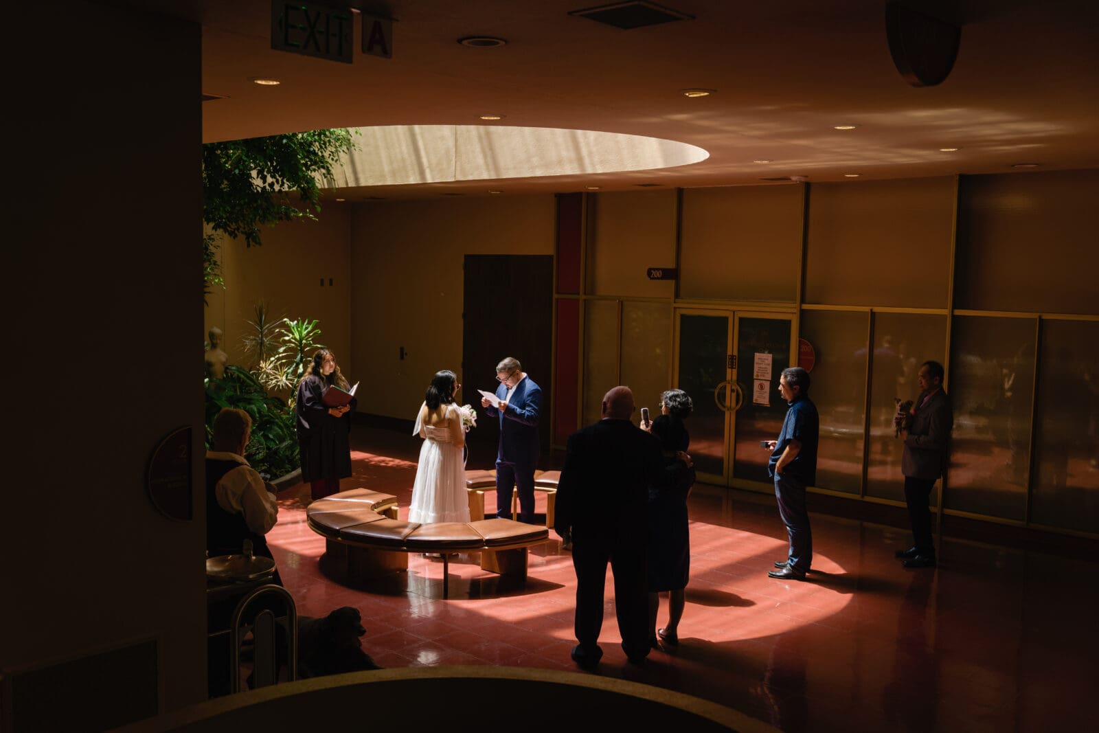 Exchanging vows during a civil ceremony wedding at Marin County Civic Center